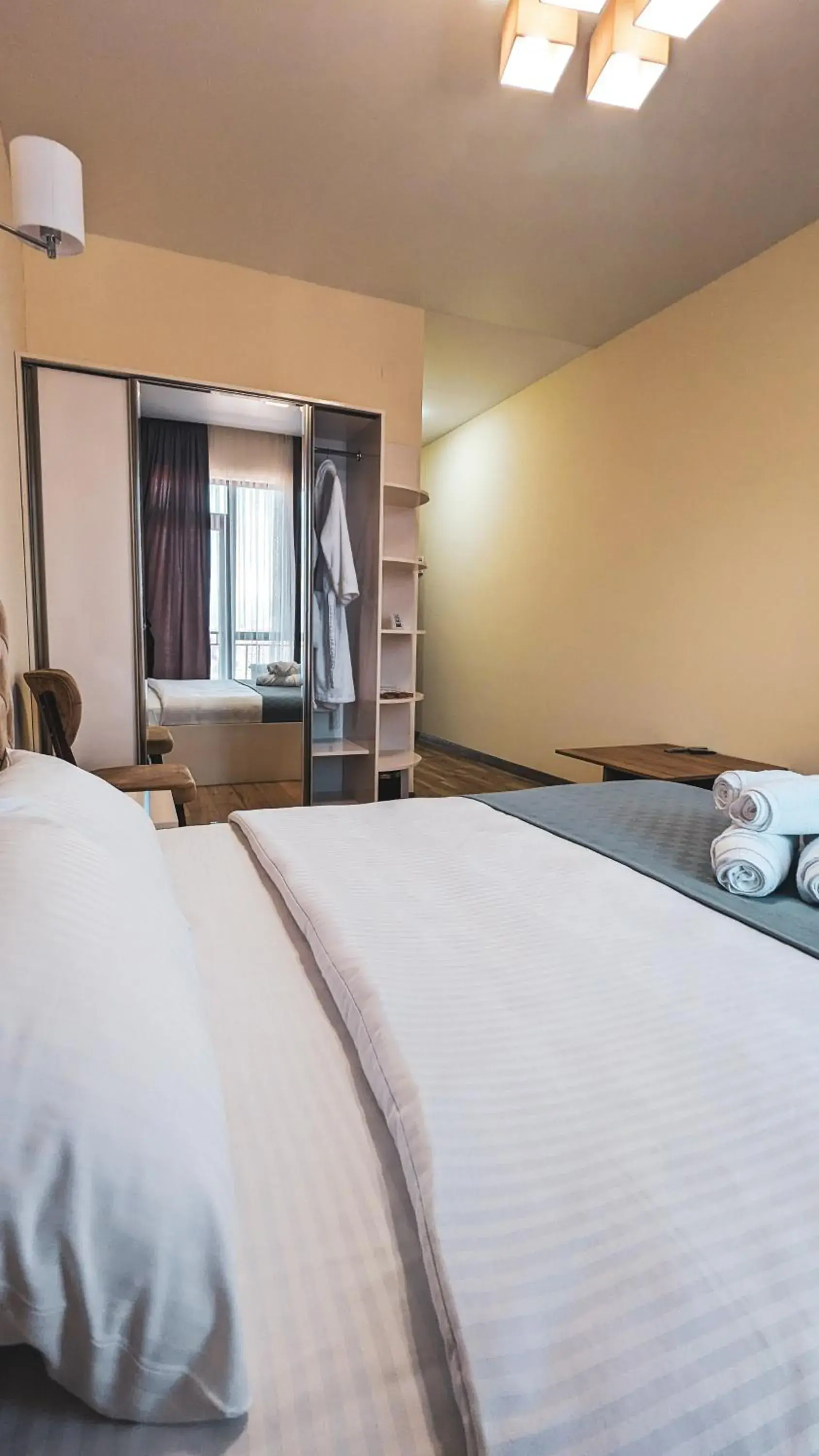 Bed in GG ApartHotel Bed in GG ApartHotel