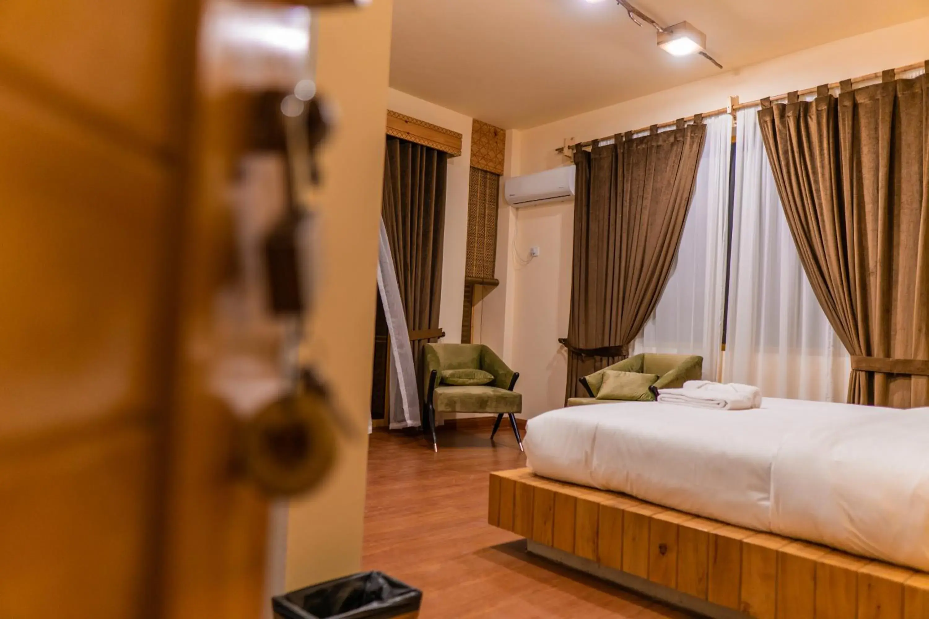 Bedroom, Bed in Dumani Nagar Hotel & Resort Bedroom, Bed in Dumani Nagar Hotel & Resort