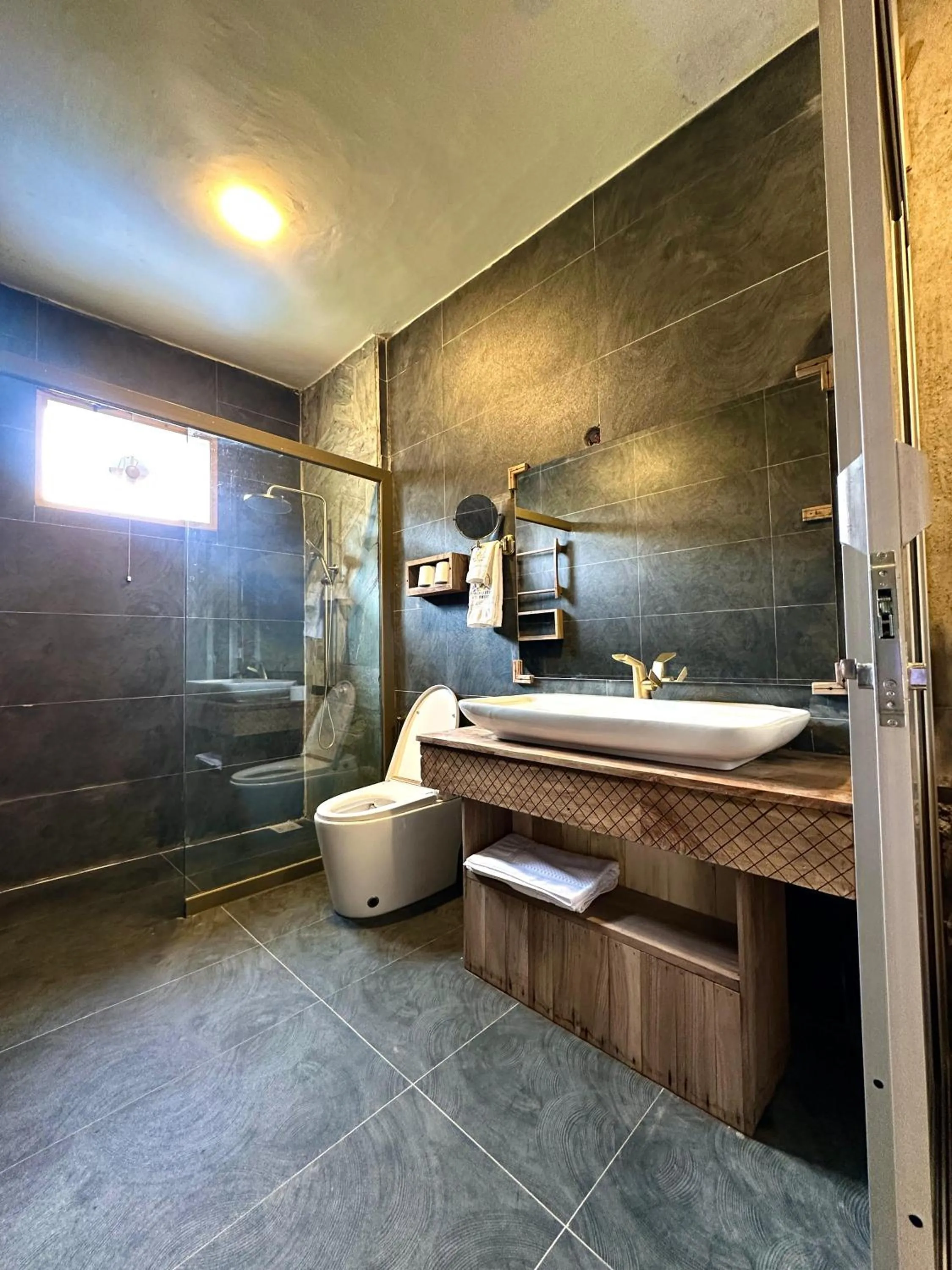 Bathroom in Dumani Nagar Hotel & Resort