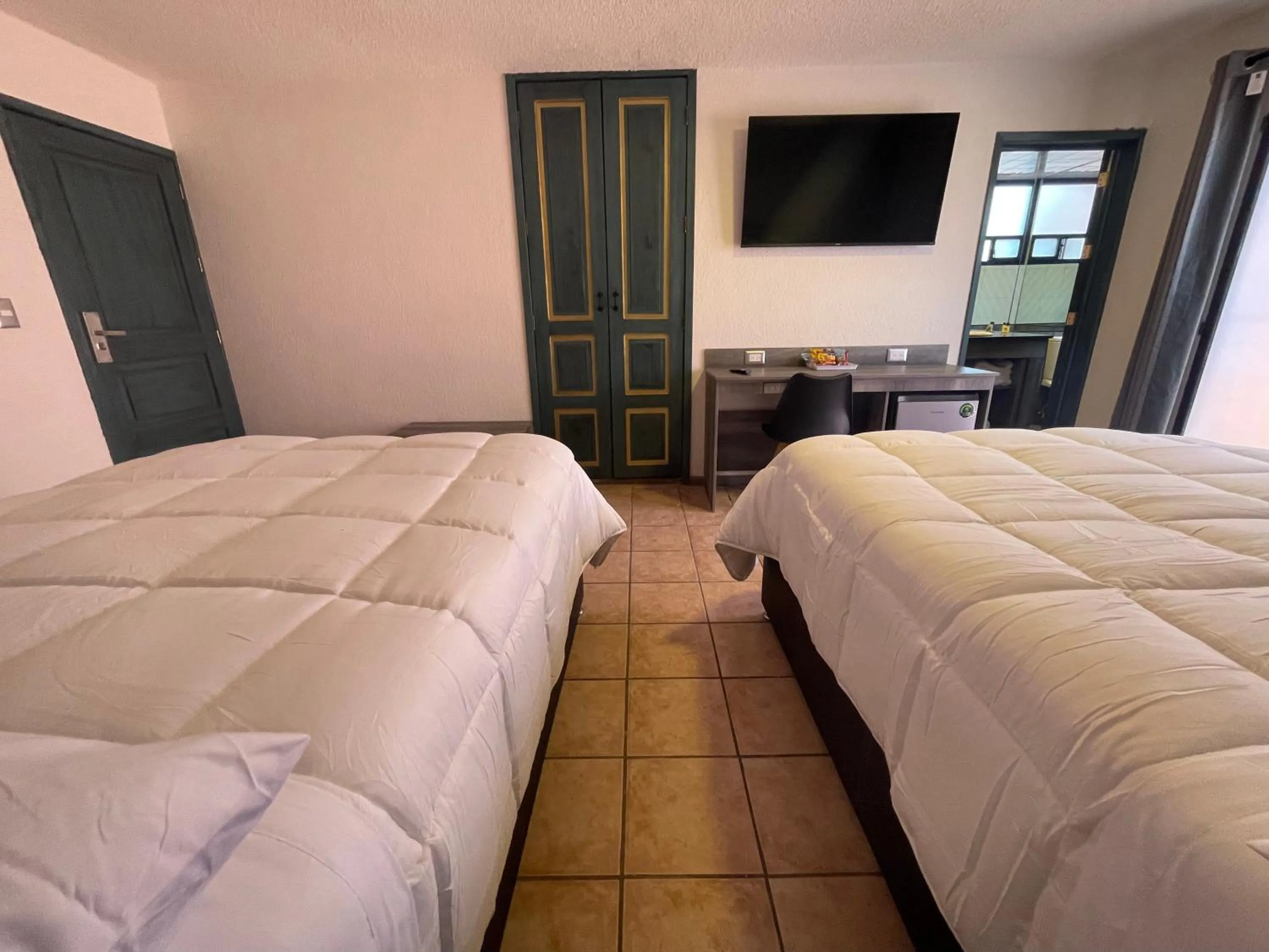 Bed in Hotel Casa Real Cholula