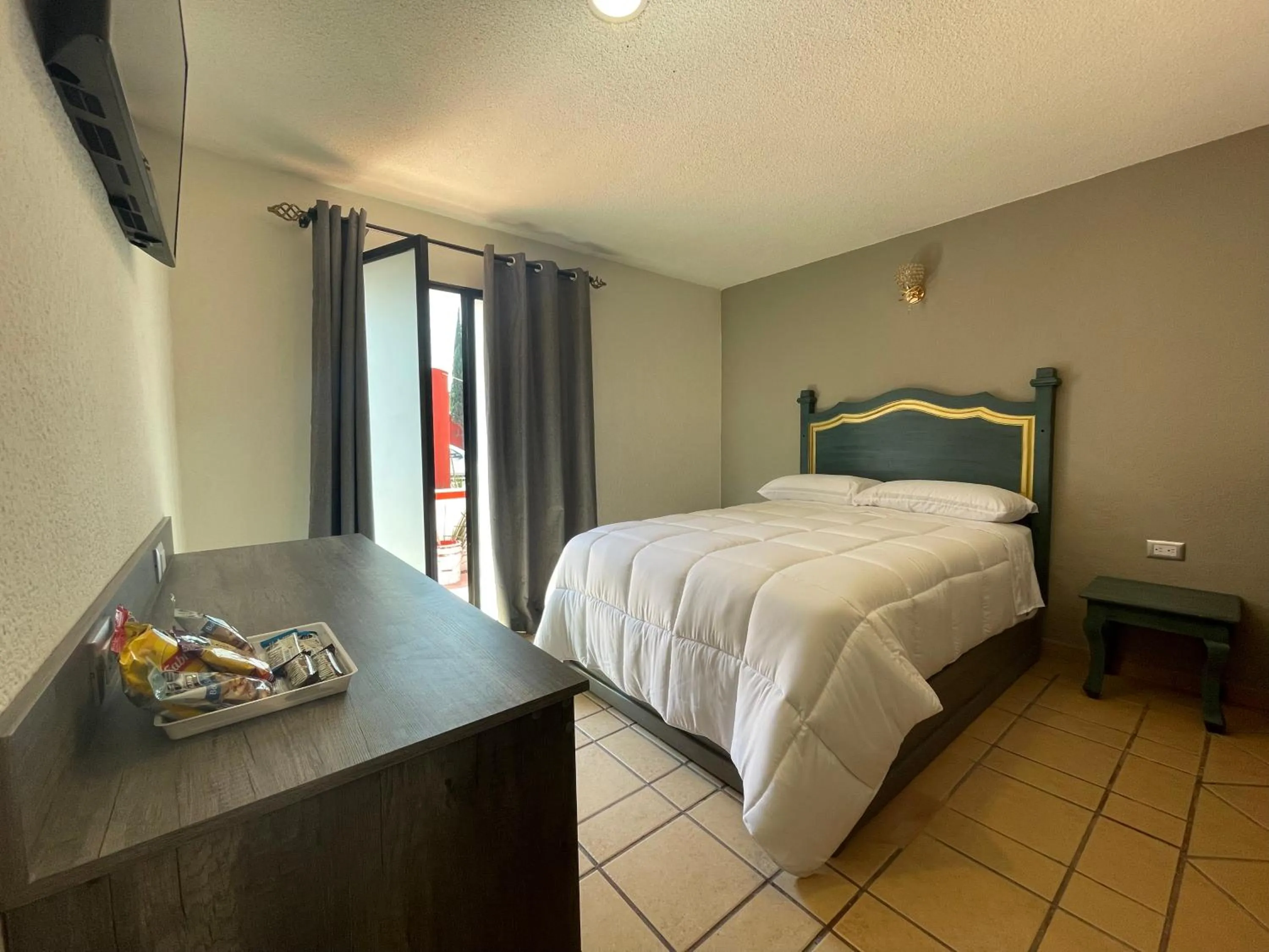 Bed in Hotel Casa Real Cholula