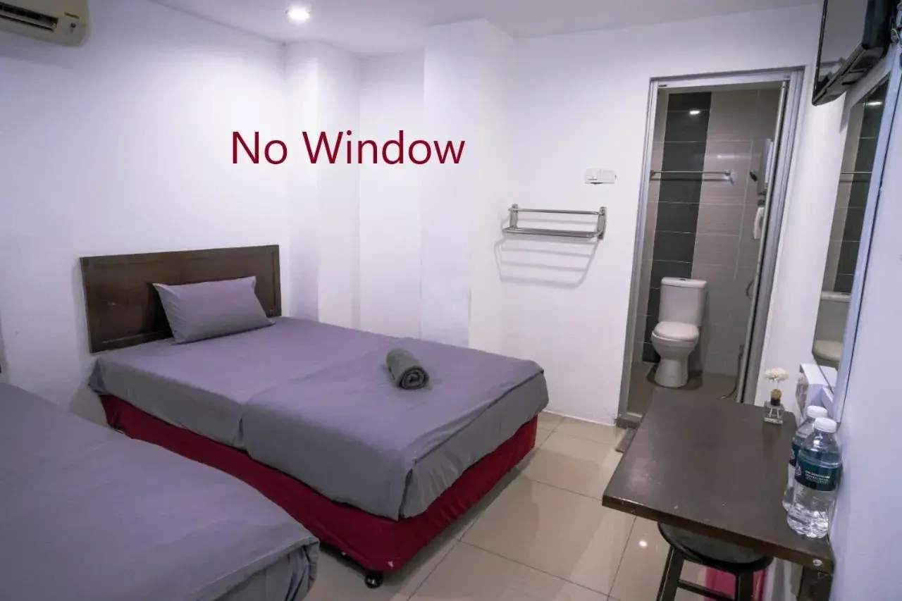 Twin Room with Private Bathroom in Heritage Inn Twin Room with Private Bathroom in Heritage Inn