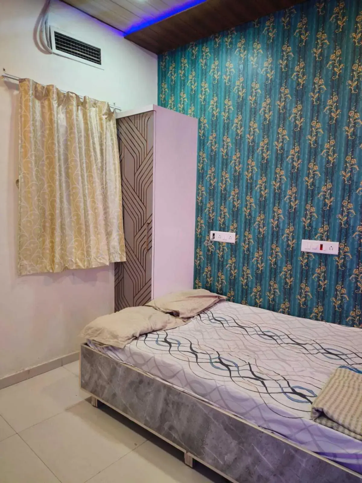 Bedroom in Hotel O Good Day Guest House Bedroom in Hotel O Good Day Guest House