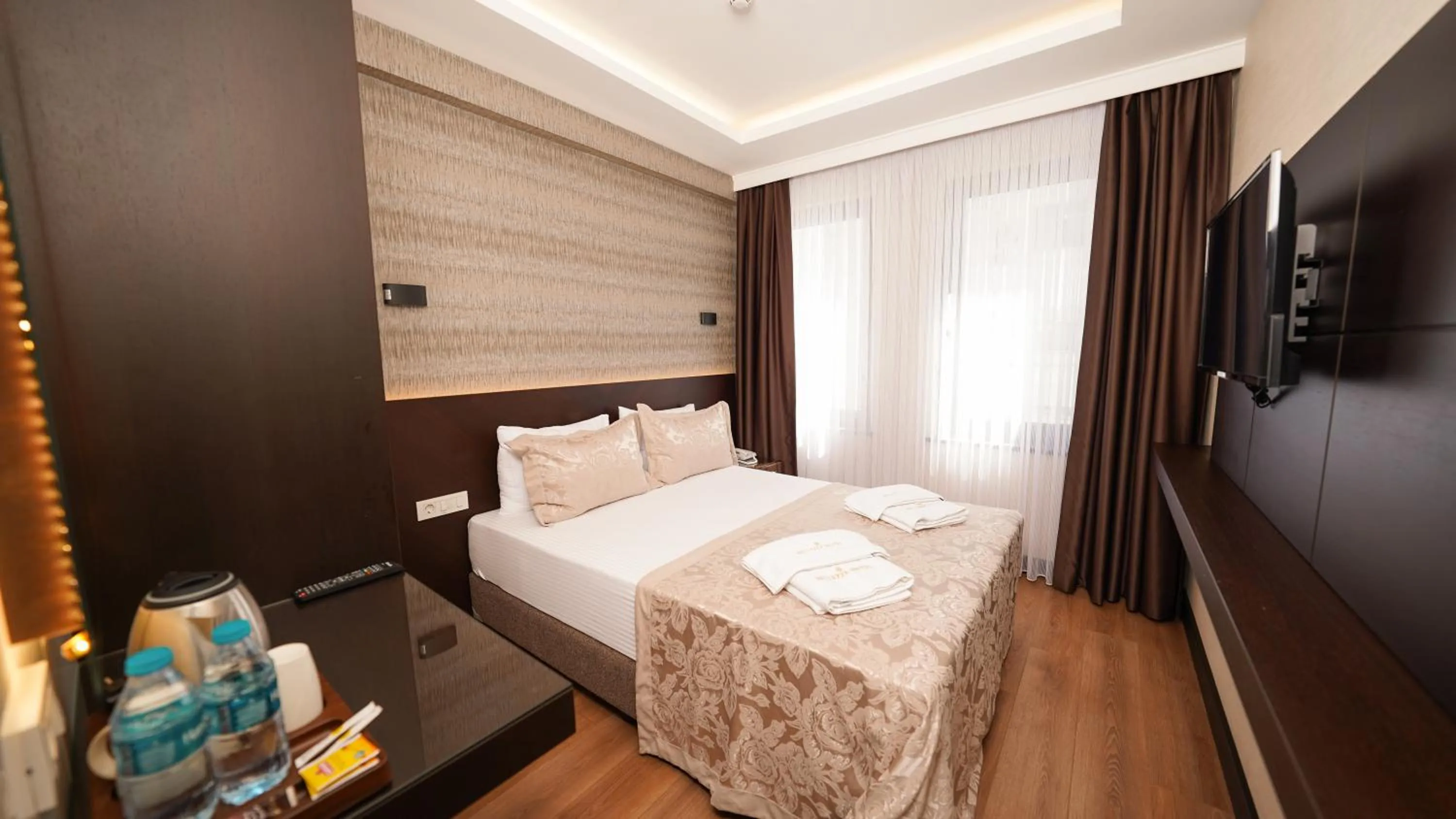 Bed in Bellezza Hotel