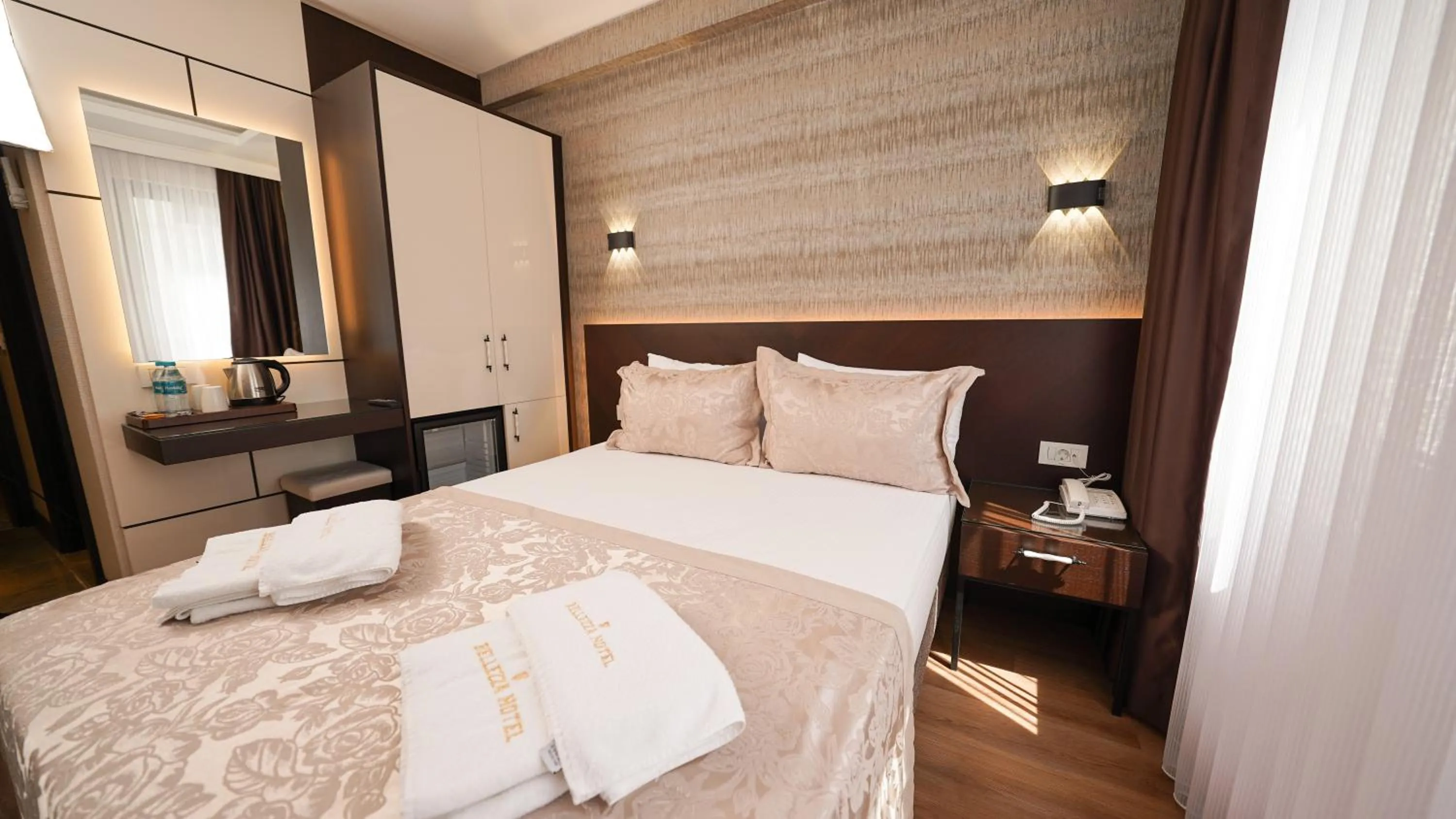 Bed in Bellezza Hotel