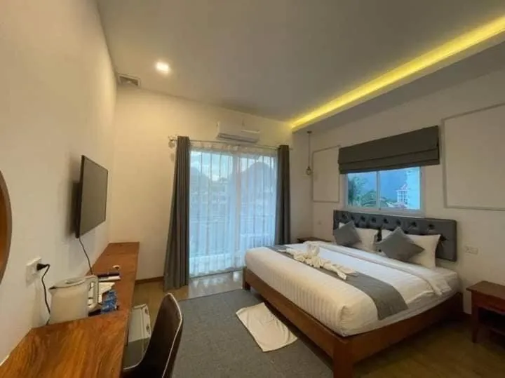 Bed in VangVieng Crystal Boutique Hotel