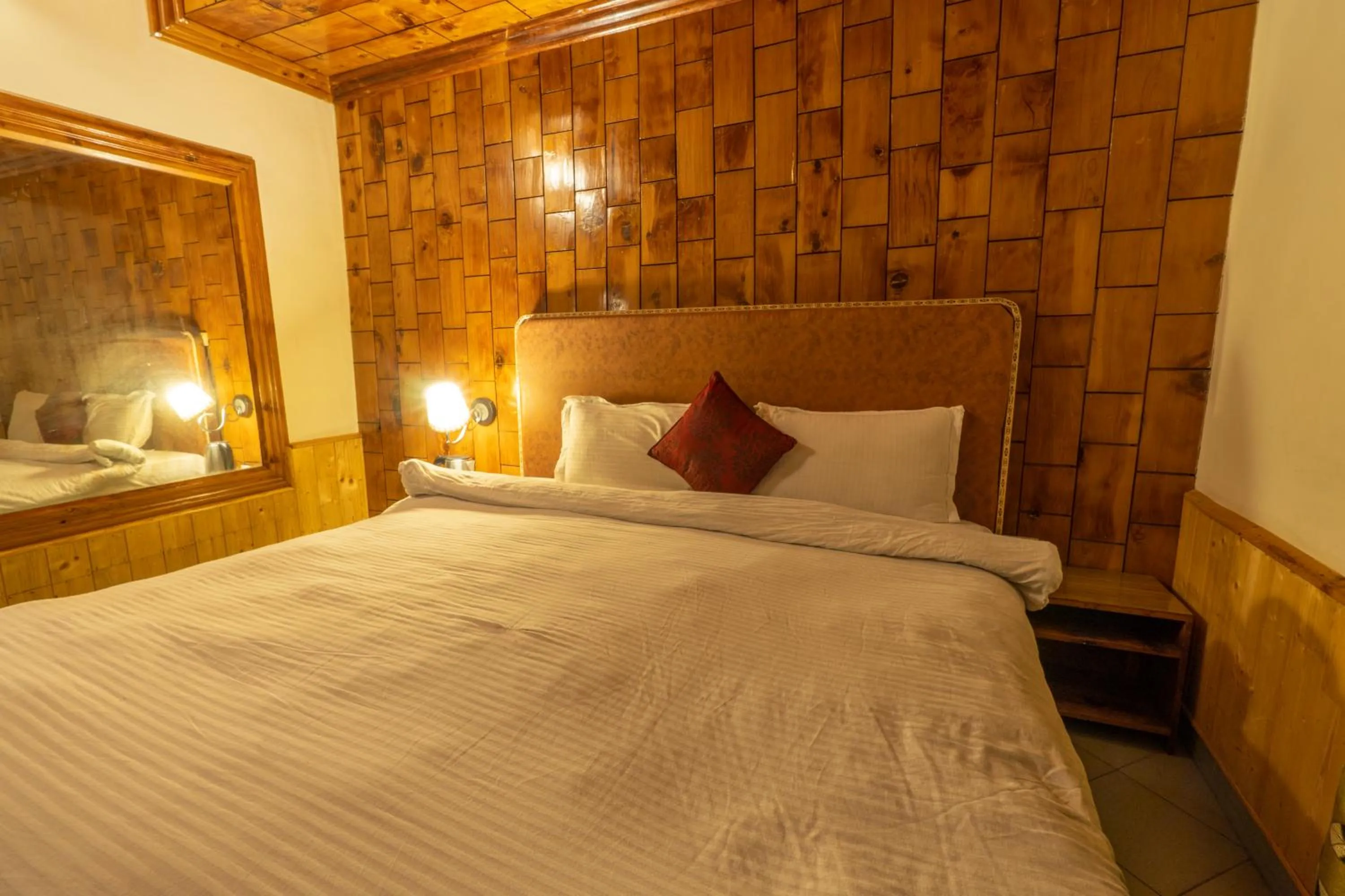 Bed in Holiday Home International -Vivaan Stays