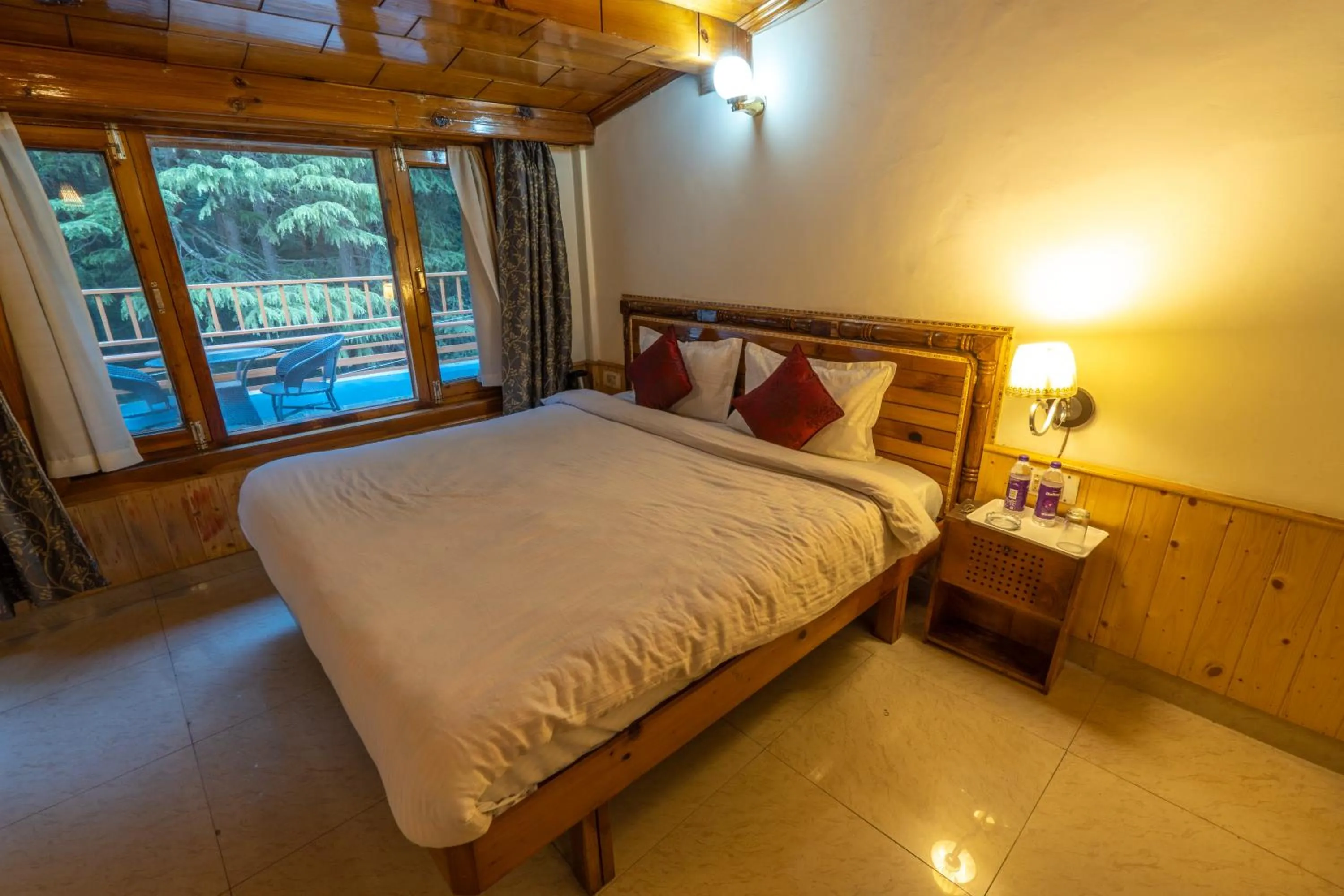 Bed in Holiday Home International -Vivaan Stays