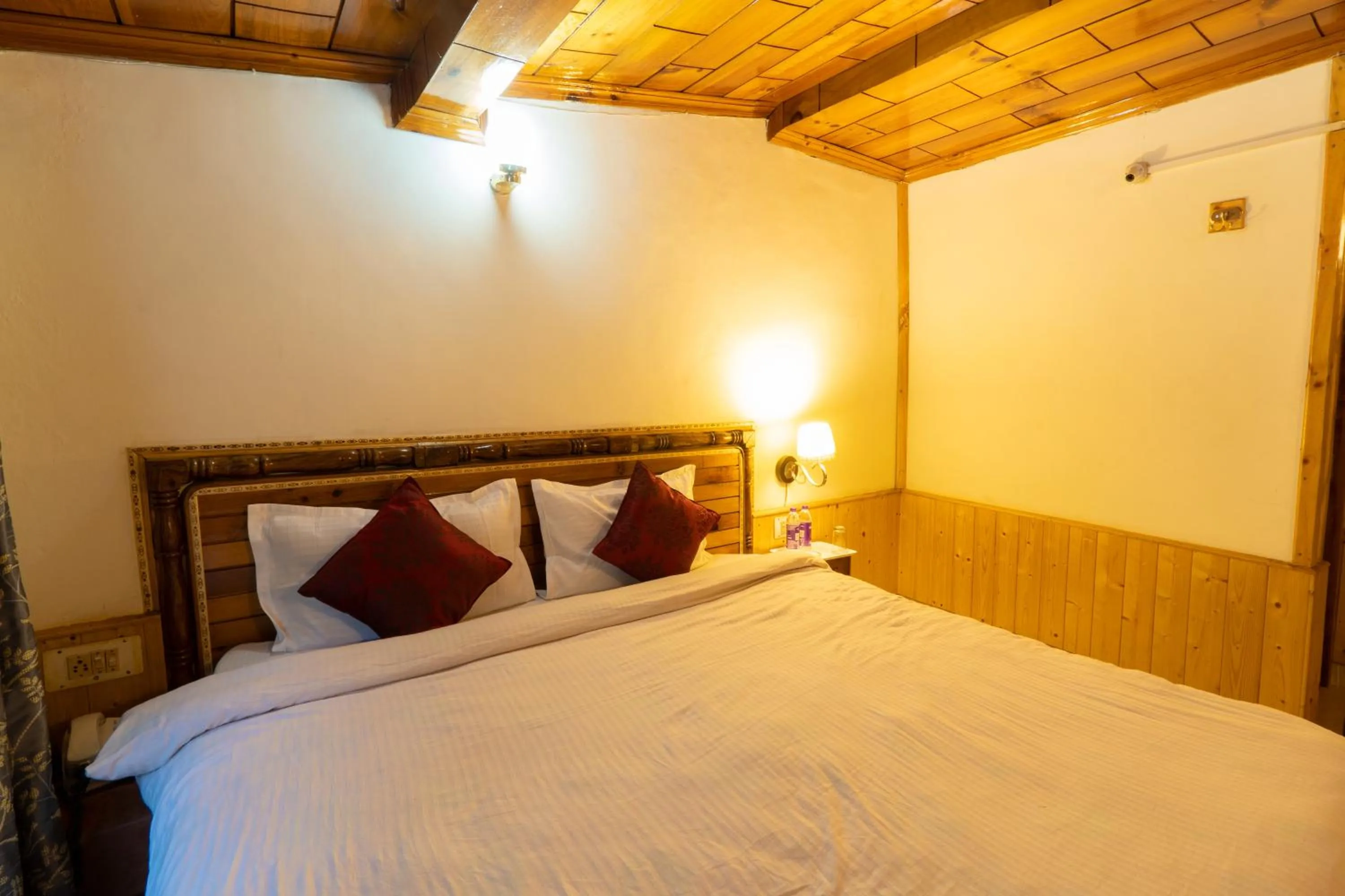 Bed in Holiday Home International -Vivaan Stays