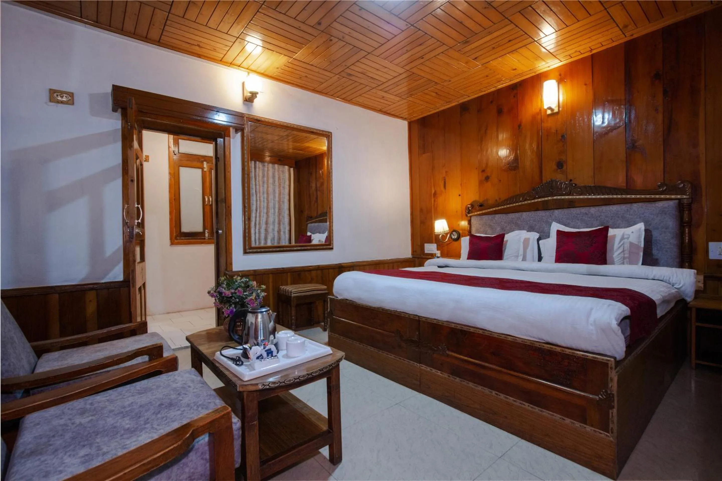 Bed in Holiday Home International -Vivaan Stays