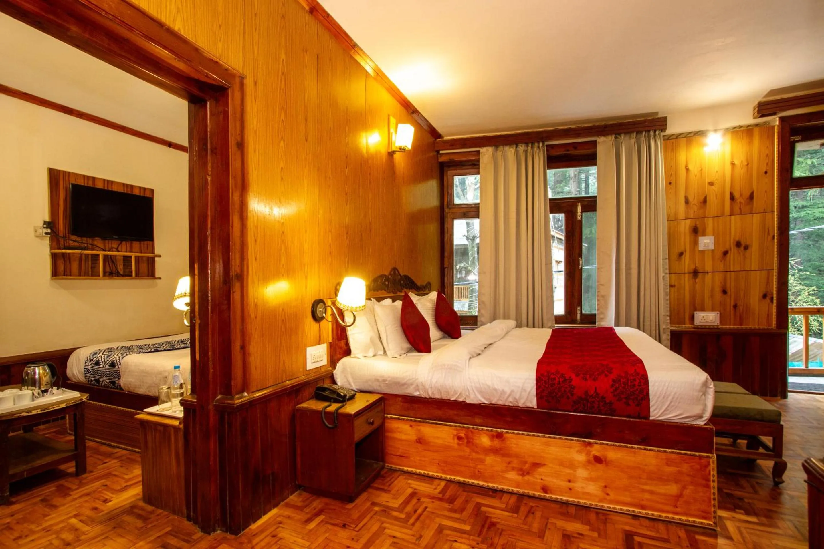 Bed in Holiday Home International -Vivaan Stays