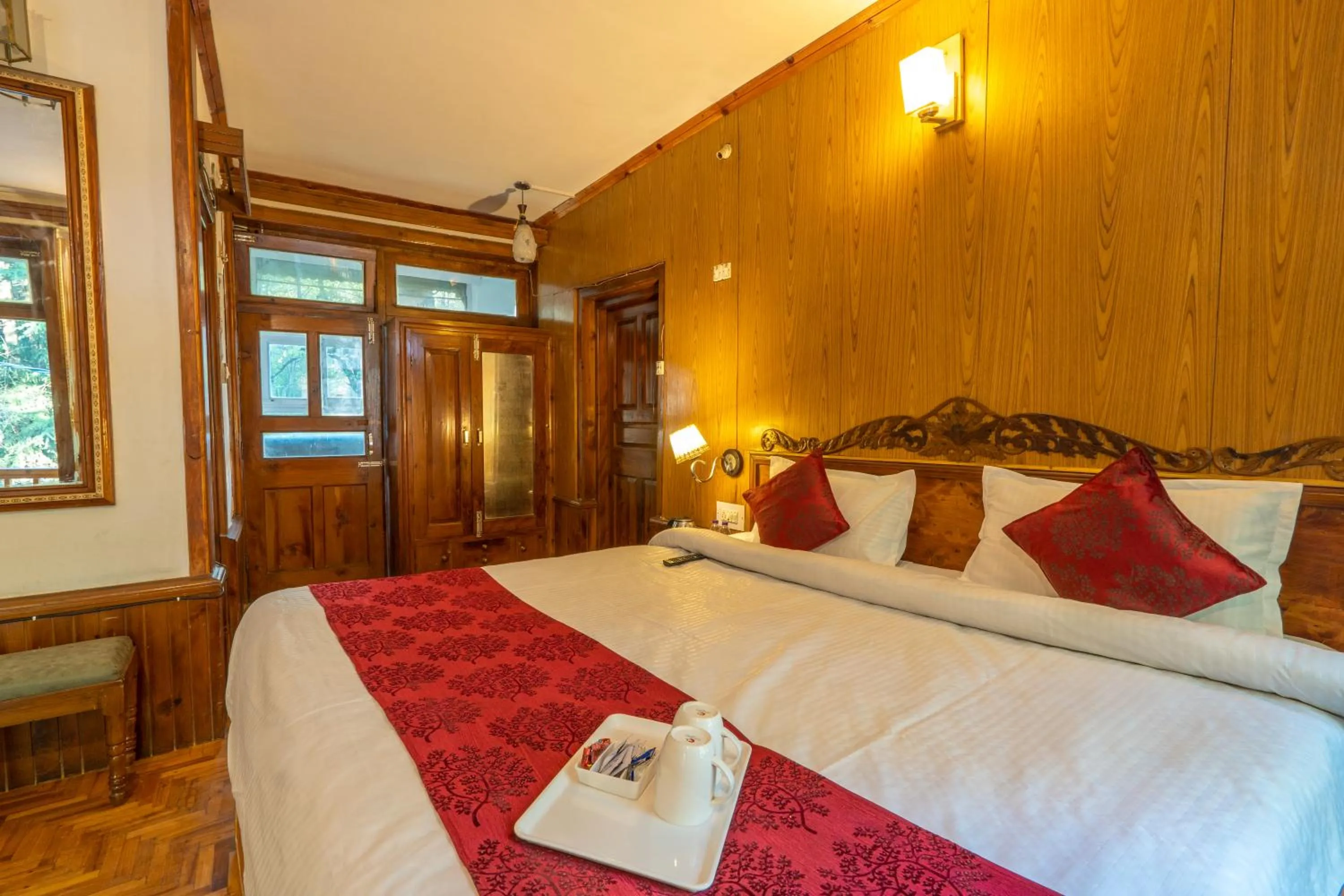 Bed in Holiday Home International -Vivaan Stays