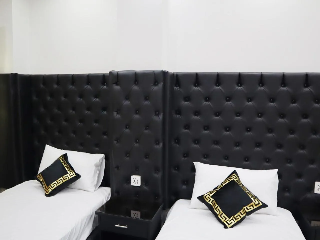 Bed in Hotel Orange One