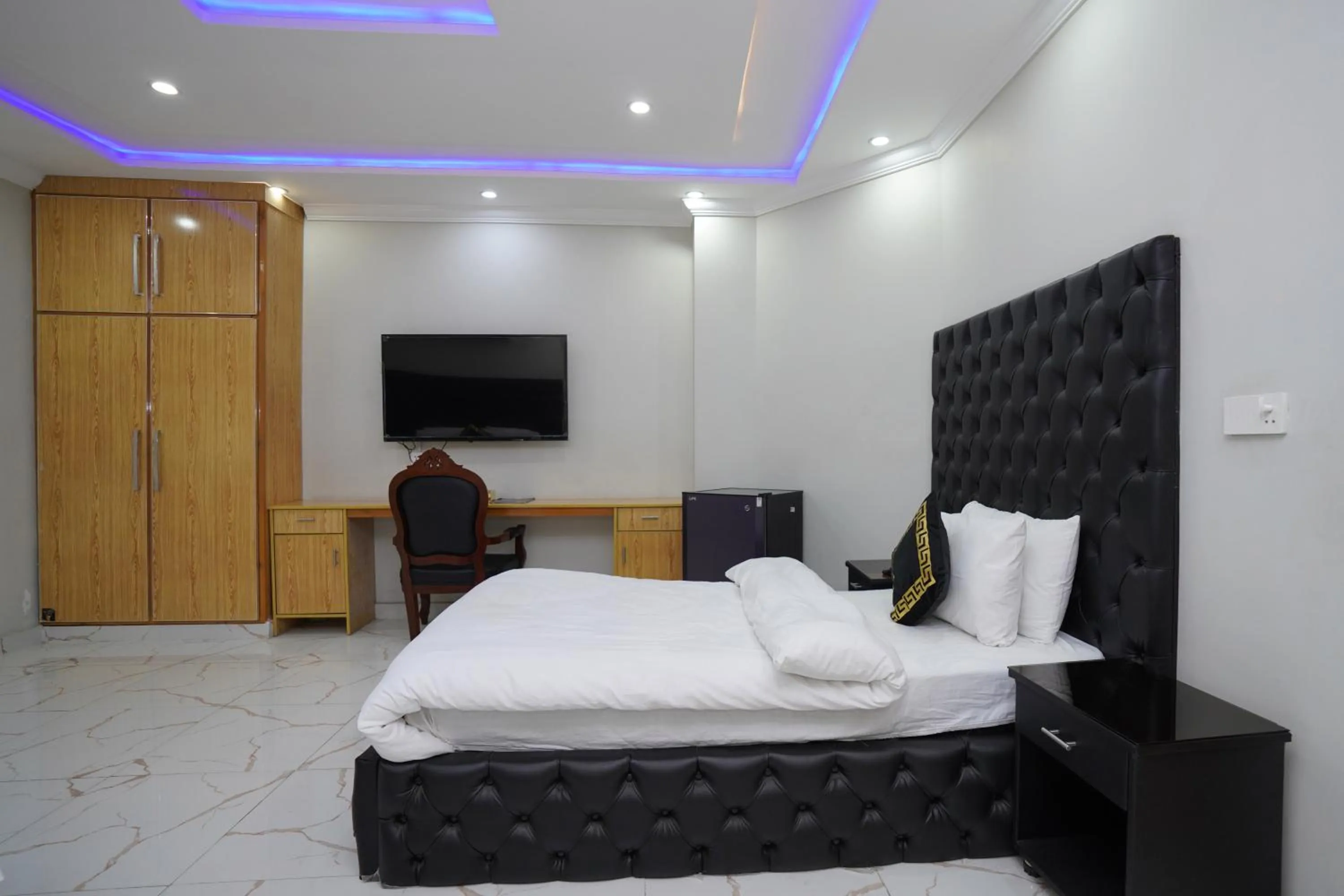 Bed in Hotel Orange One