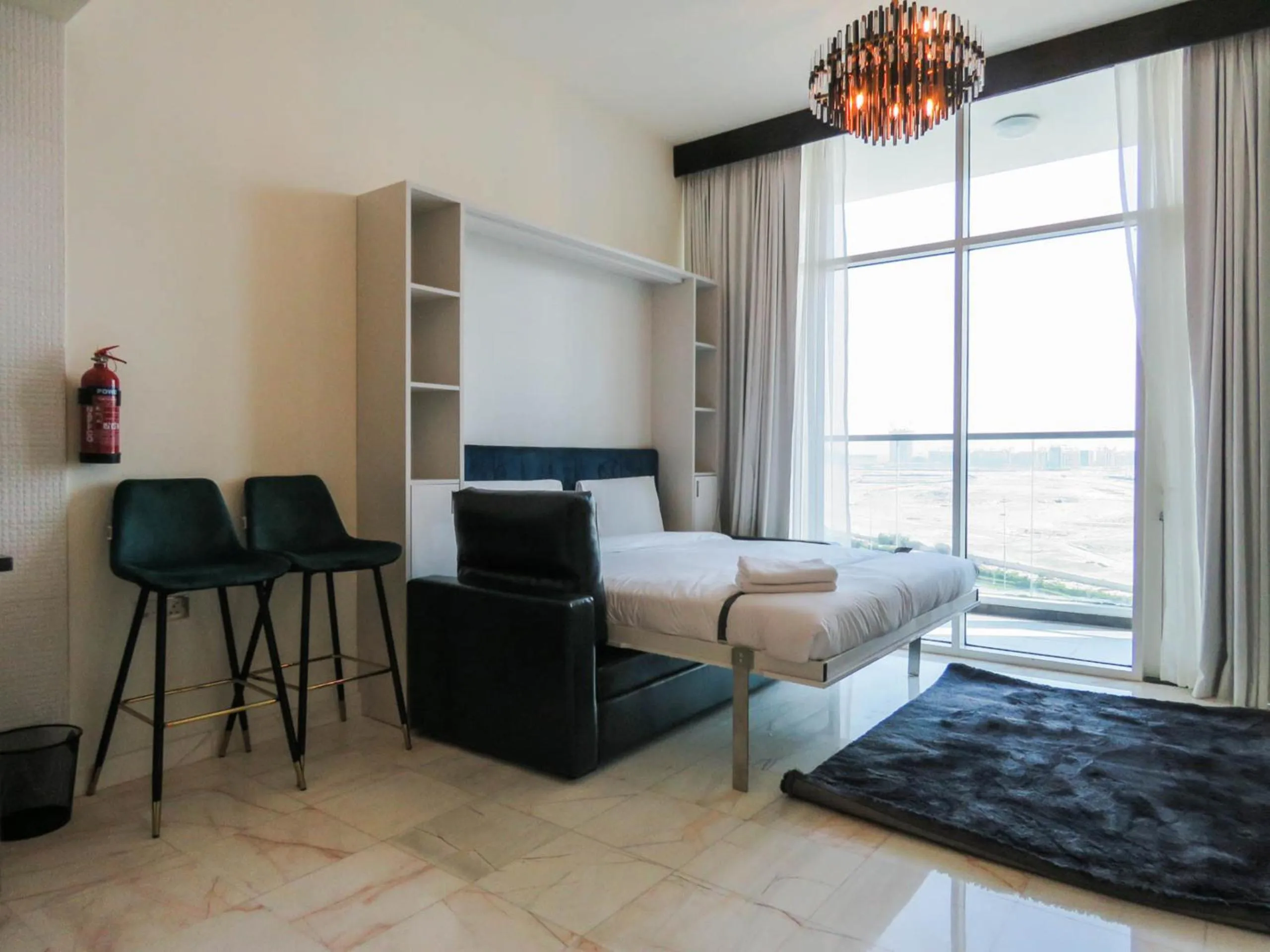Photo of the whole room, Seating Area in OYO 943 Home Bayz Danube studio