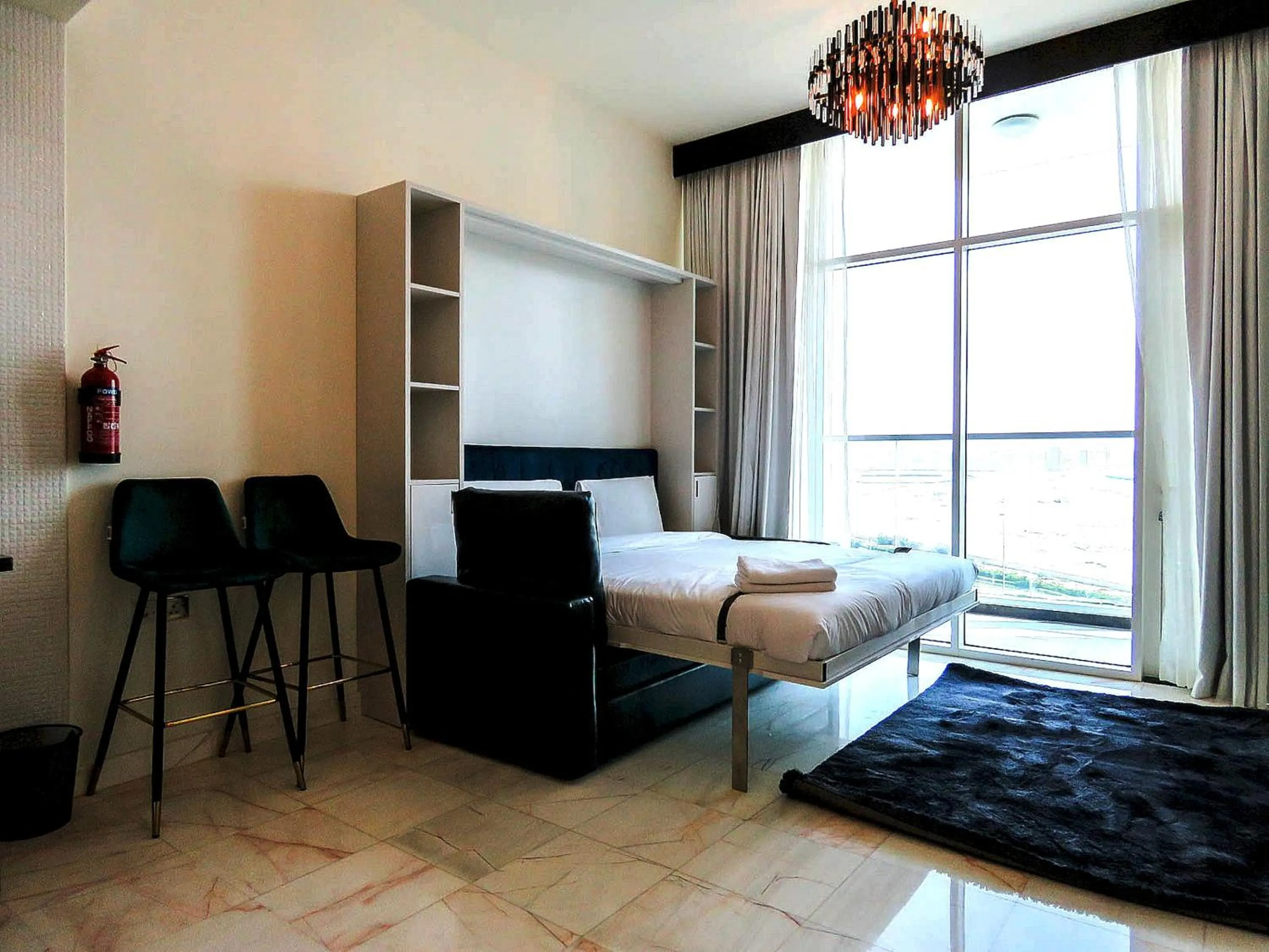Photo of the whole room, Seating Area in OYO 943 Home Bayz Danube studio