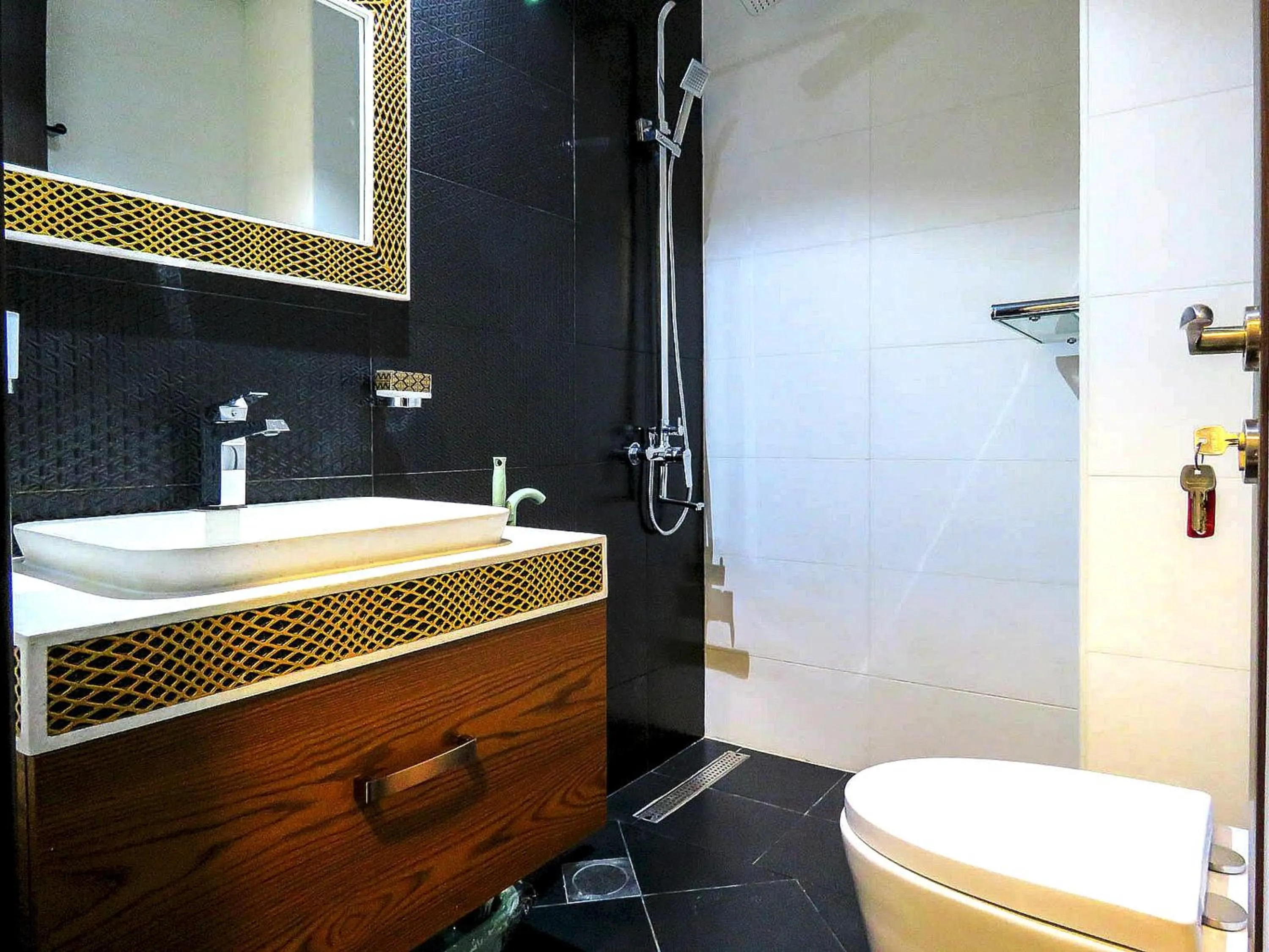 Bathroom in OYO 943 Home Bayz Danube studio
