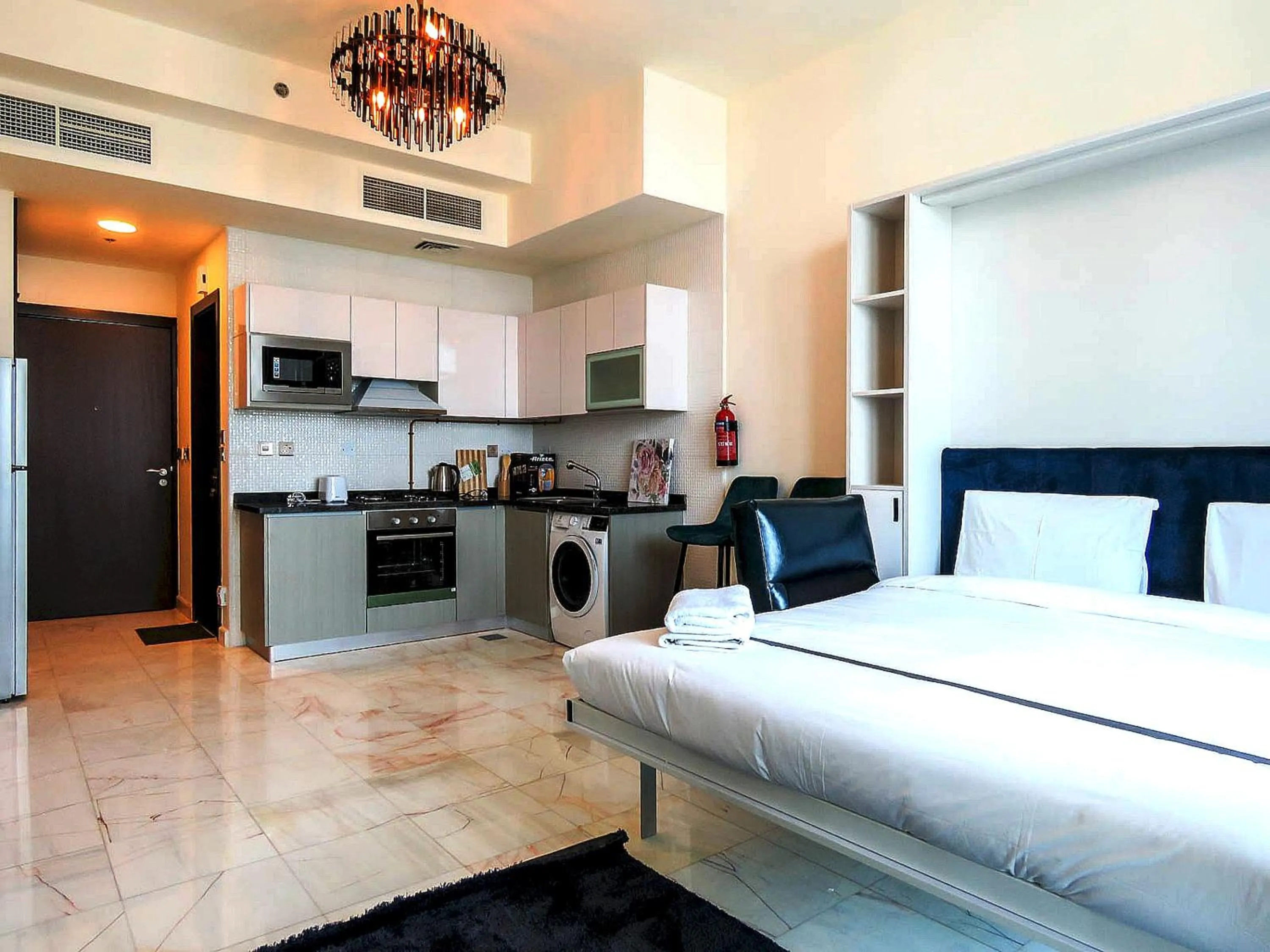 Photo of the whole room, Kitchen/Kitchenette in OYO 943 Home Bayz Danube studio