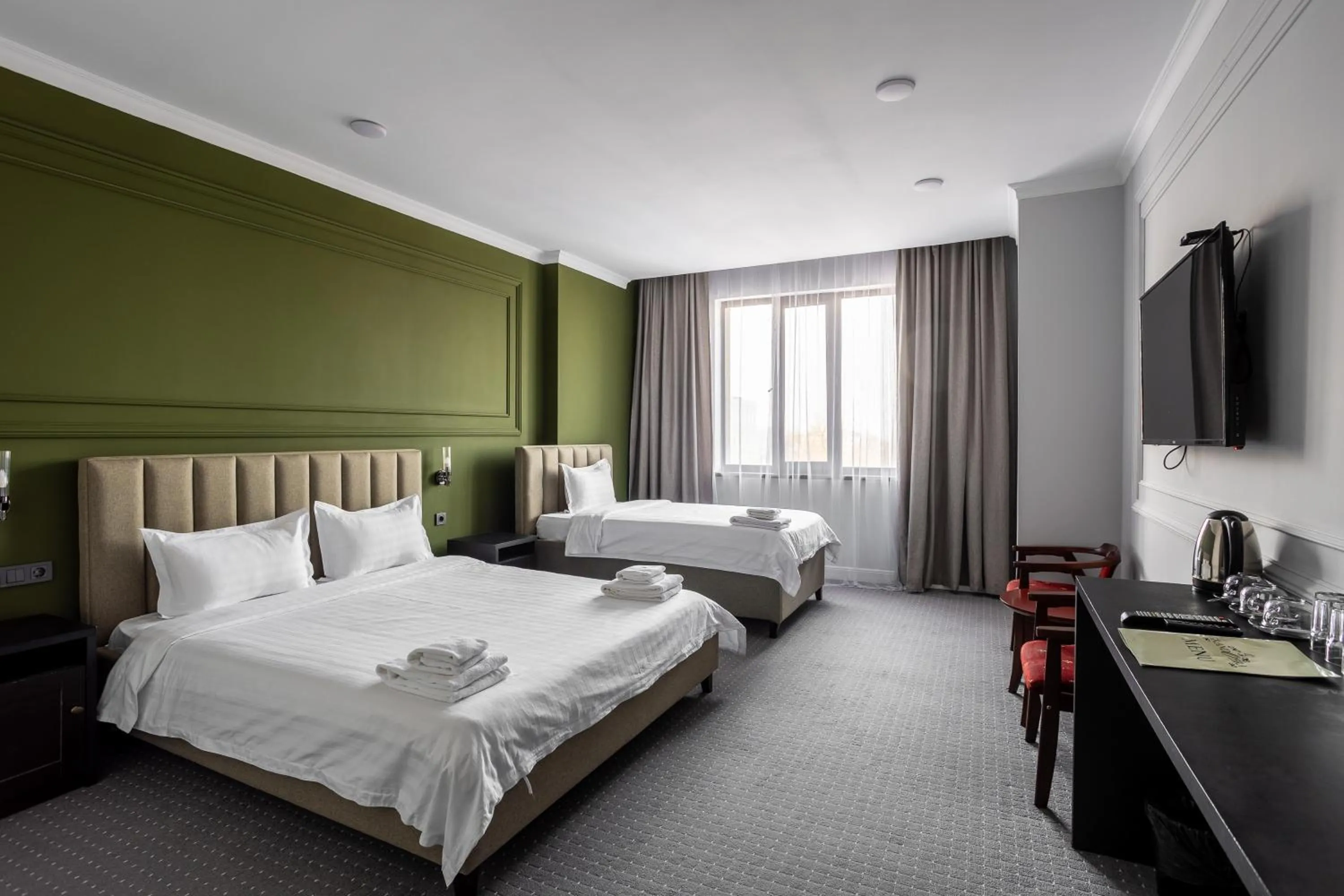 Bed in GRAND OPERA HOTEL