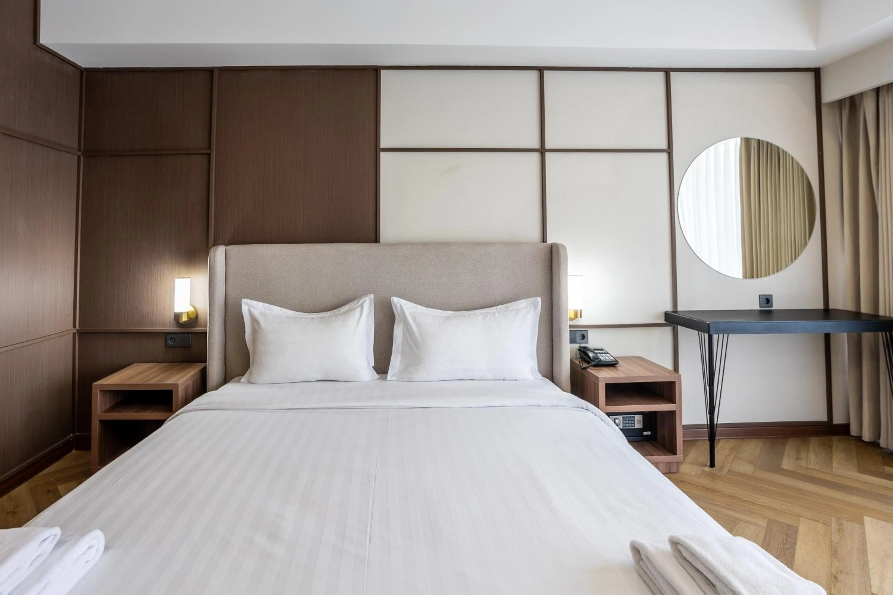 Bed in GRAND OPERA HOTEL