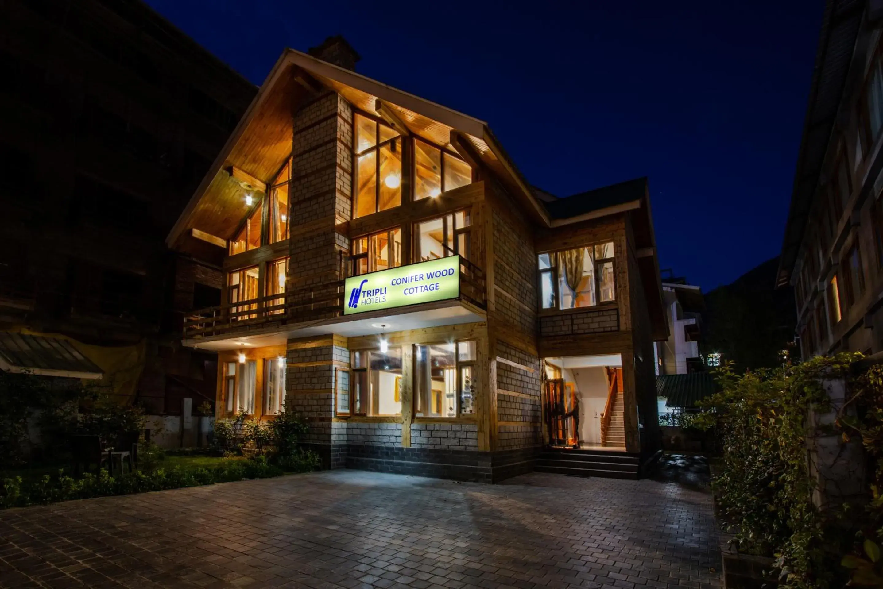 Property building in Tripli Hotels Conifer Wood Cottage Property building in Tripli Hotels Conifer Wood Cottage