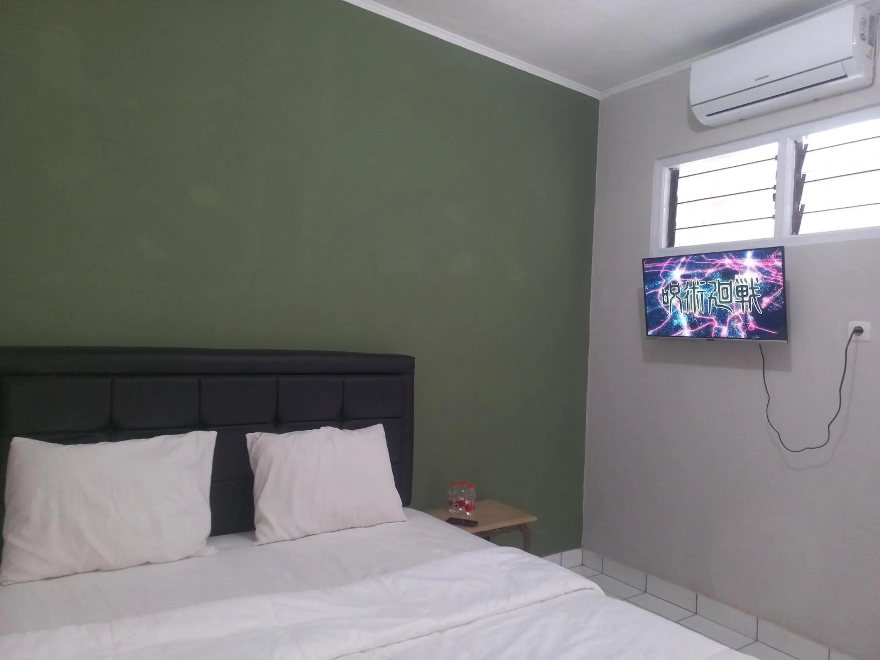 Bedroom in SPOT ON 92415 Bima House Syariah