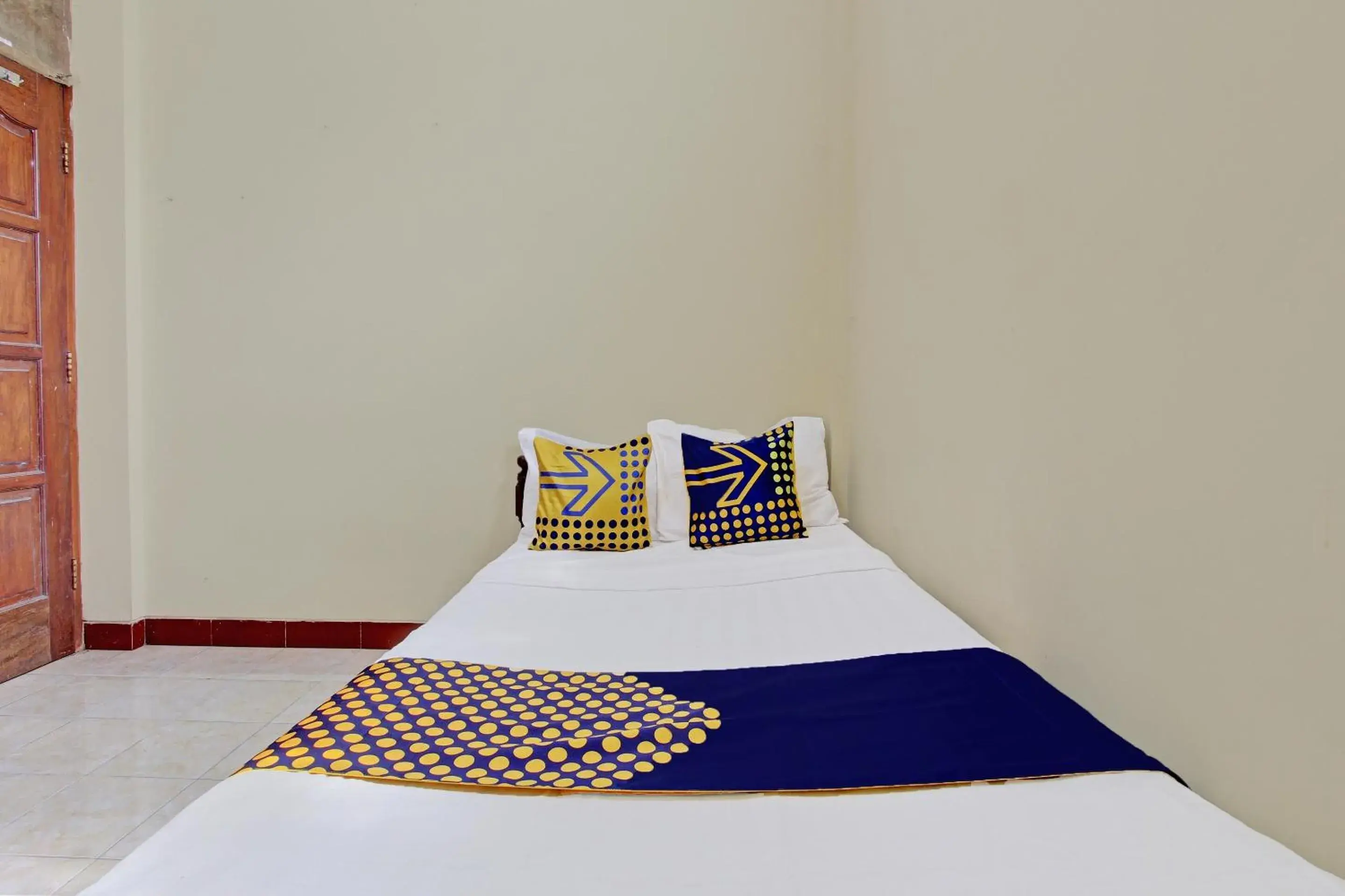 Bedroom in Hotel O Puri Kasih Guest House Syariah Bedroom in Hotel O Puri Kasih Guest House Syariah