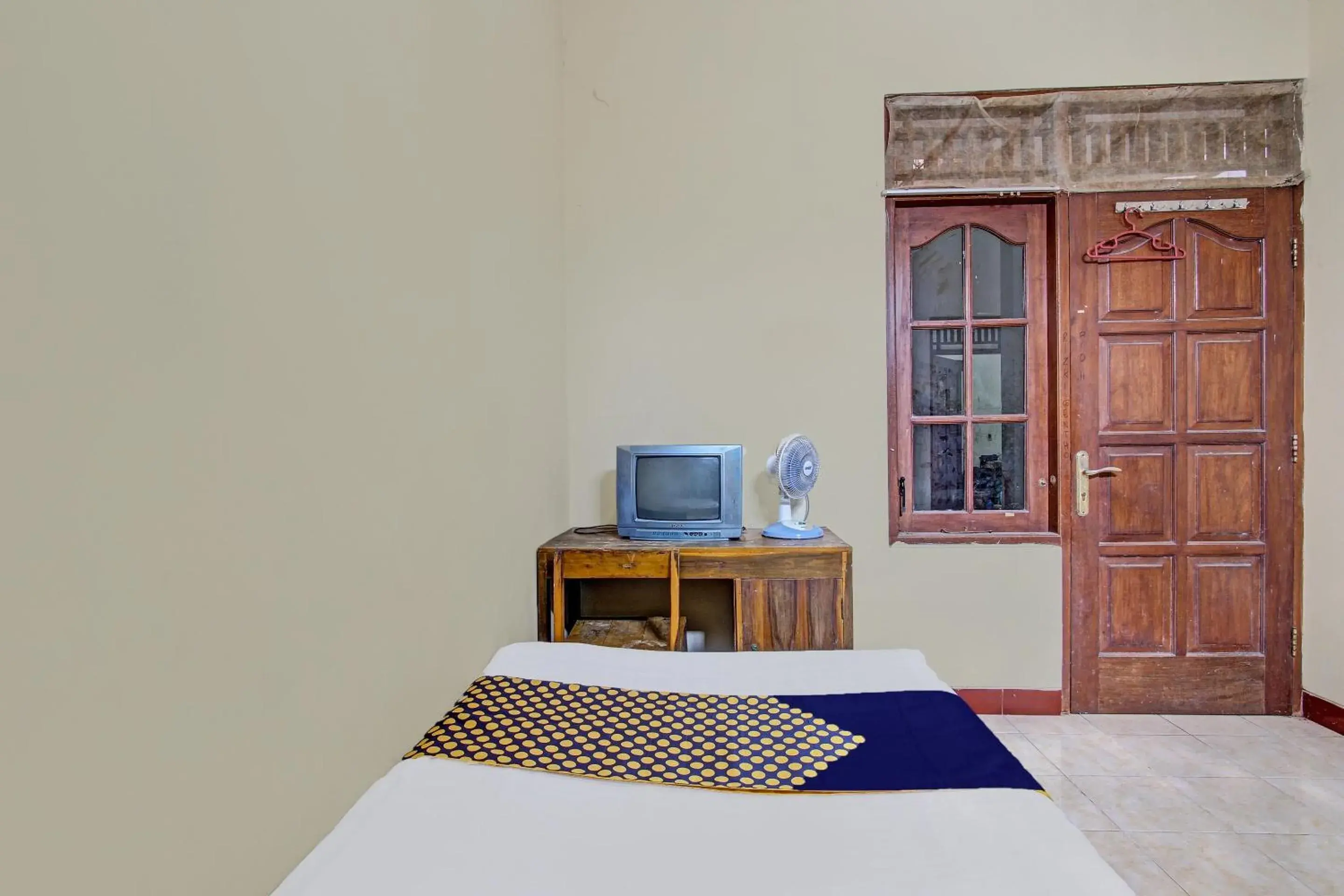 Bedroom in Hotel O Puri Kasih Guest House Syariah Bedroom in Hotel O Puri Kasih Guest House Syariah