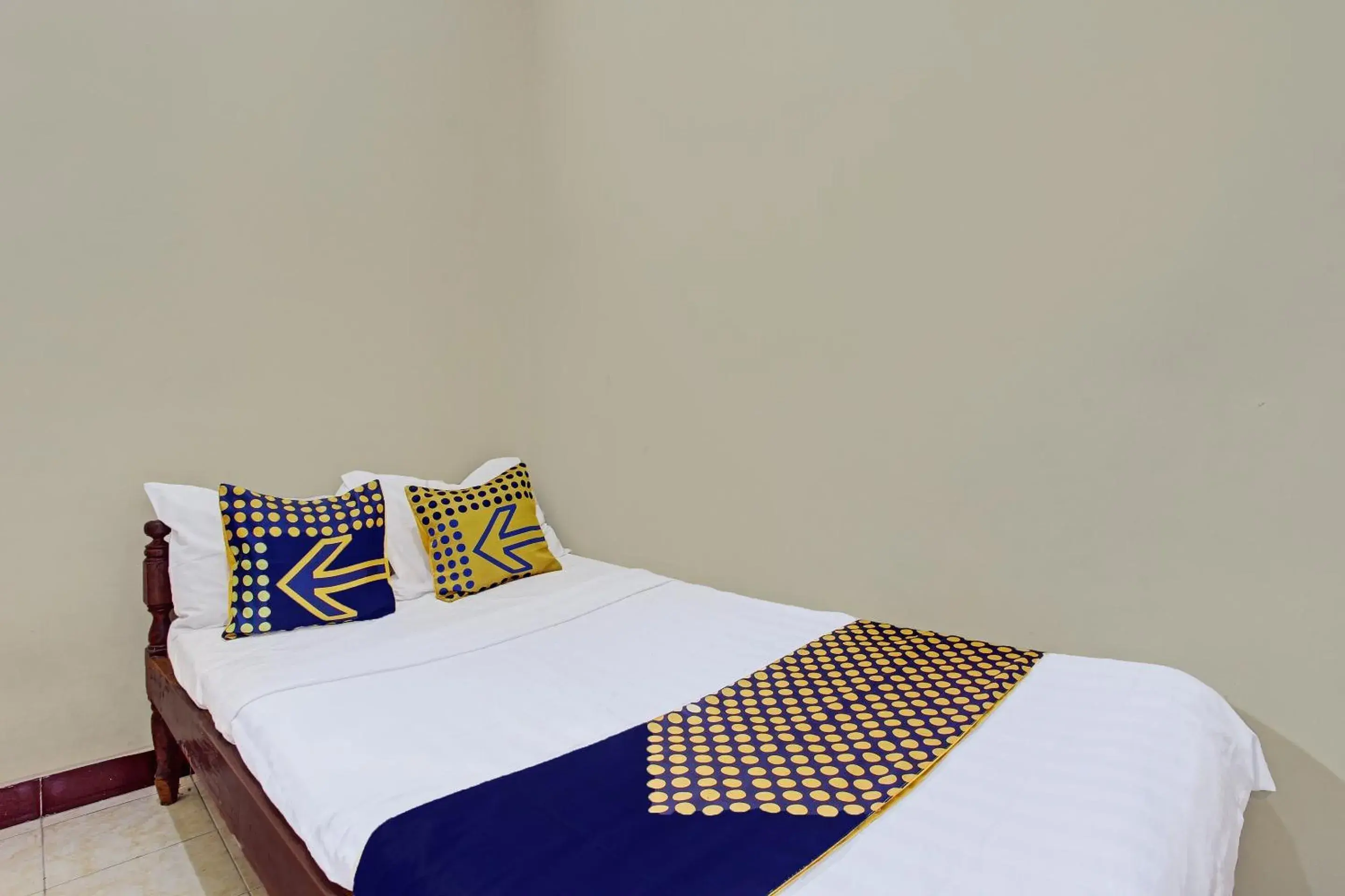 Bedroom in Hotel O Puri Kasih Guest House Syariah Bedroom in Hotel O Puri Kasih Guest House Syariah