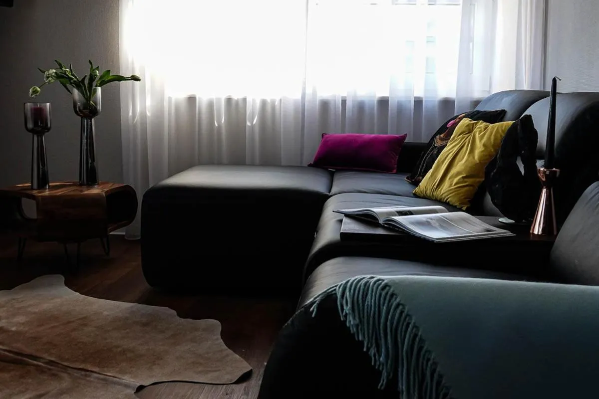 Living room, Bed in Residence Black Eagle Lubmin Strand