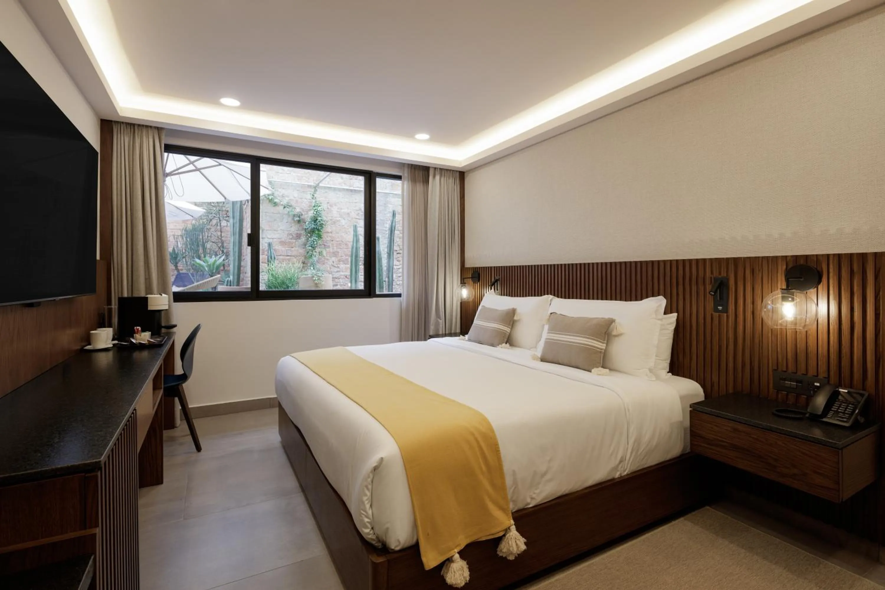 Bed in Origen 438 Luxury Boutique Hotel