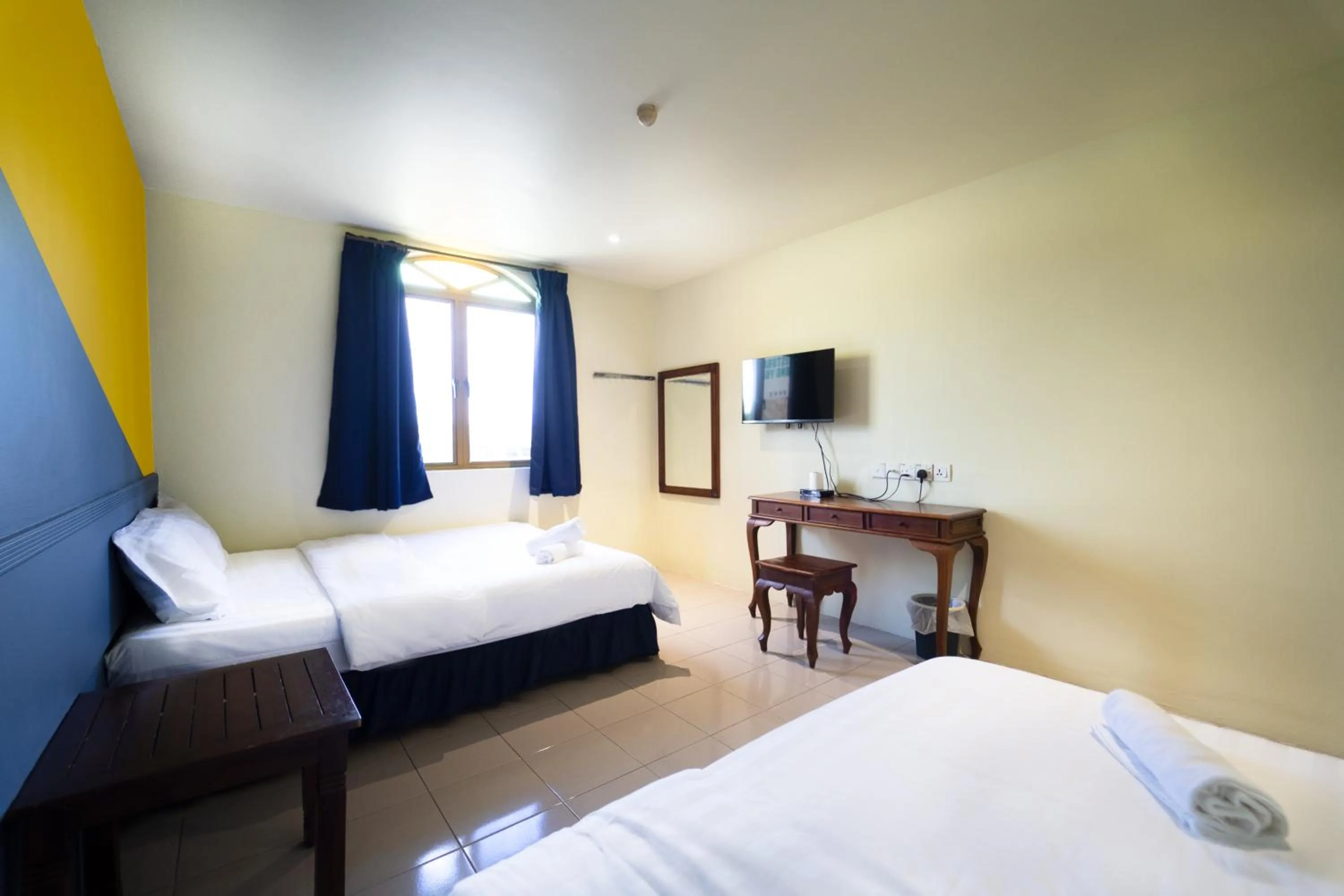 Triple Room in The Colony by Cactus Hotel Dedap