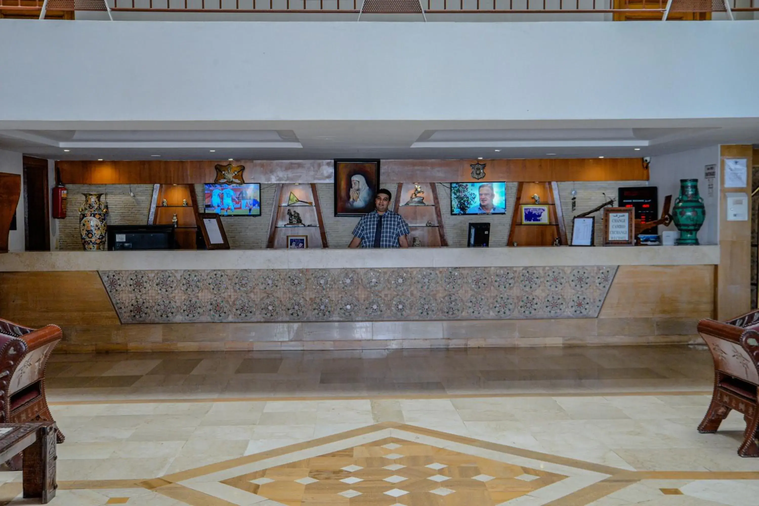 Lobby or reception in Intouriste Hôtel & Suites Lobby or reception in Intouriste Hôtel & Suites