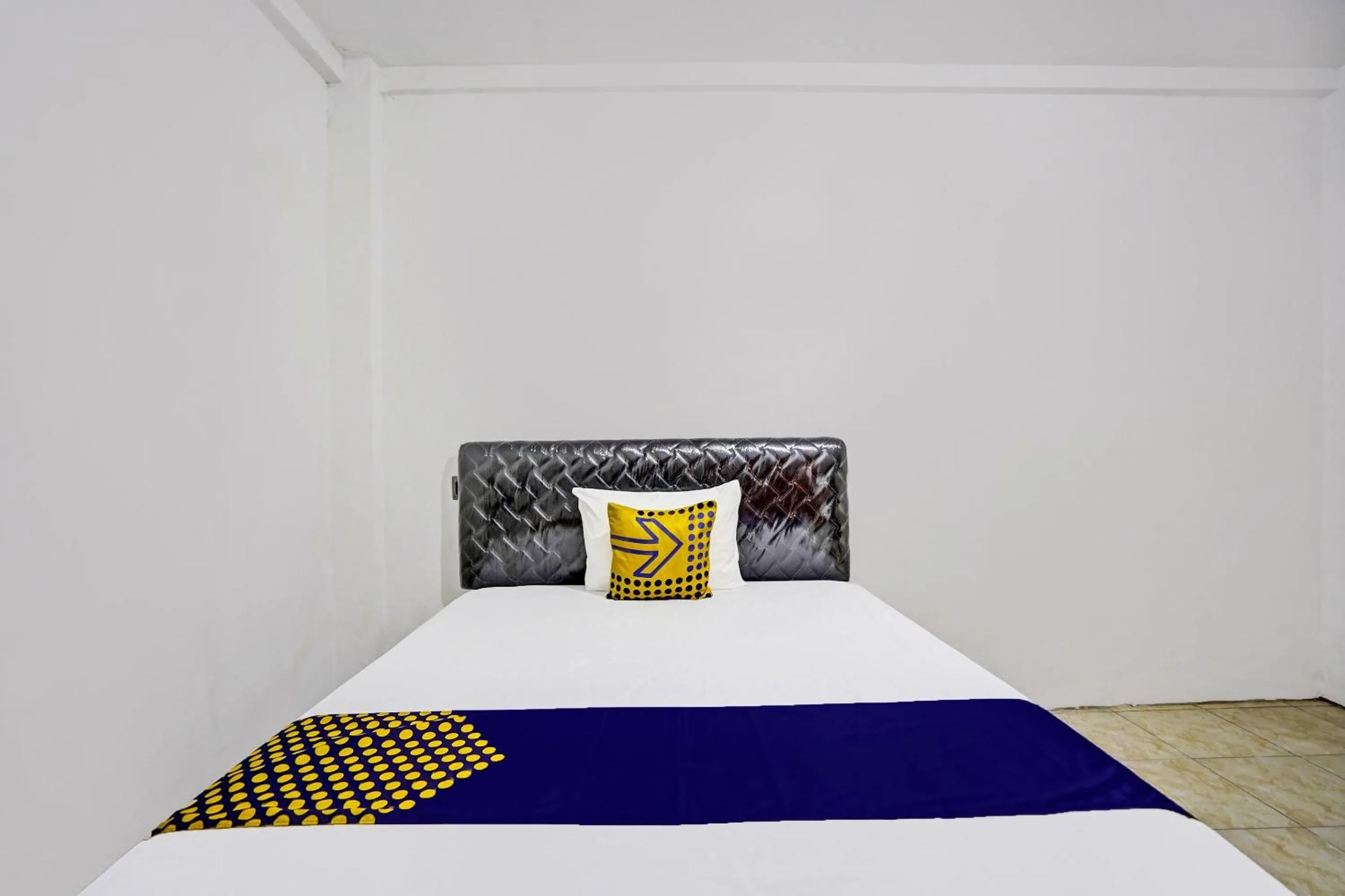 Bedroom in Hotel O Griya Sandi Residence Family NearPantai Boom