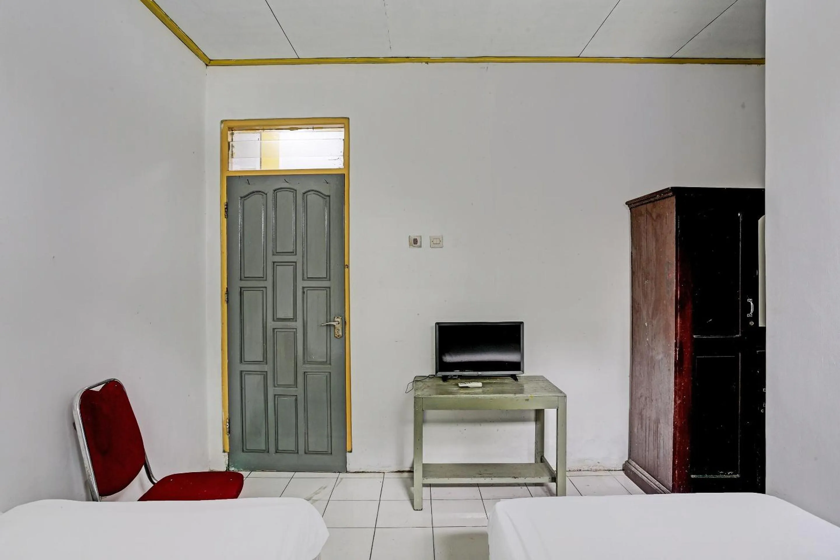 Bedroom in Hotel O Penginapan Aina Syariah