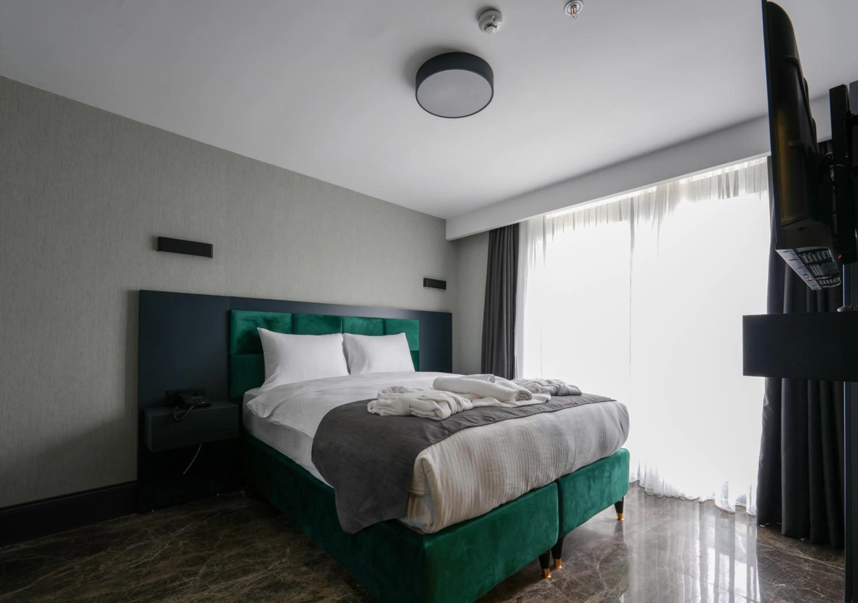 Bed in Hotel Kurucesme Business