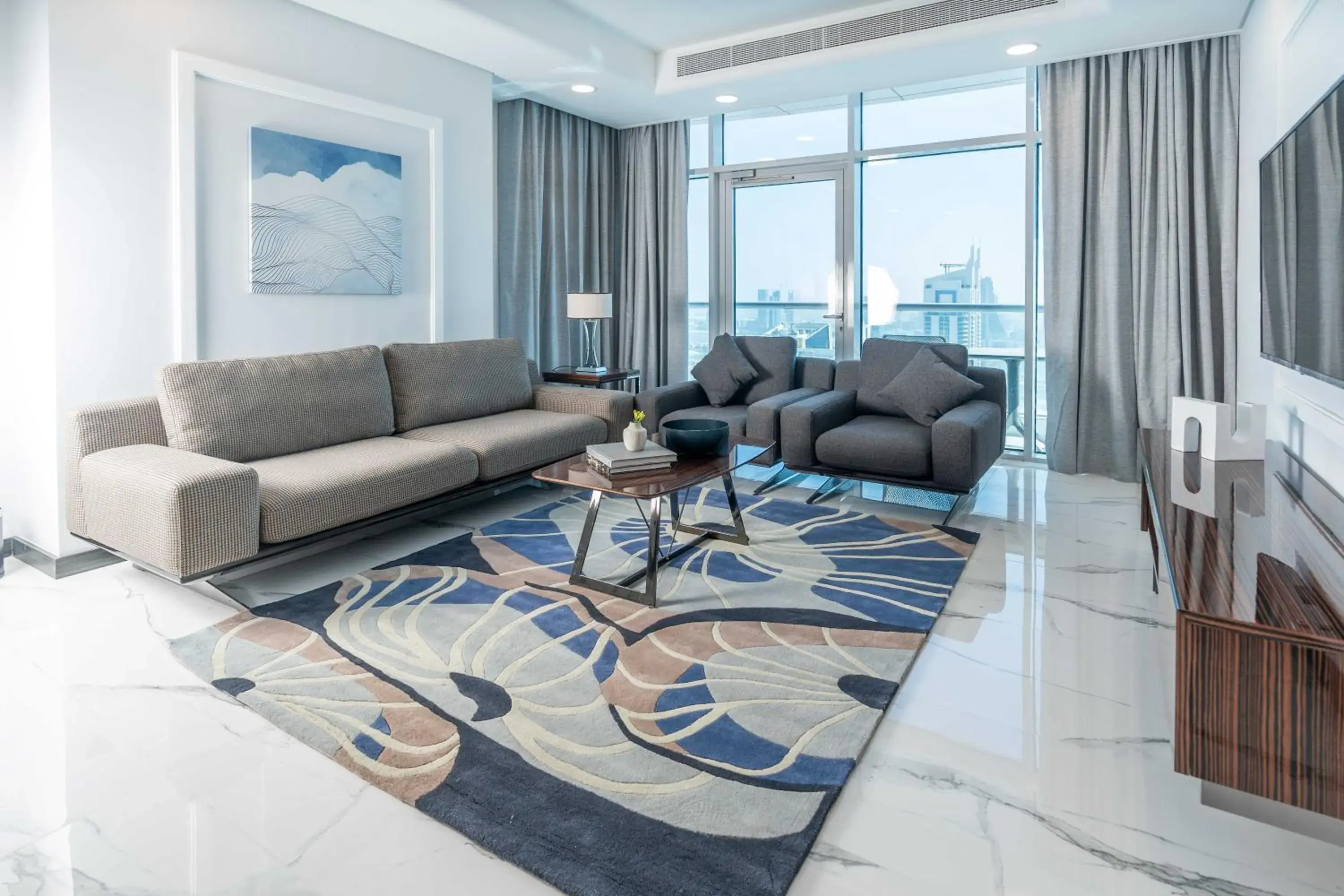 Living room in S Plaza Suites Hotel Living room in S Plaza Suites Hotel