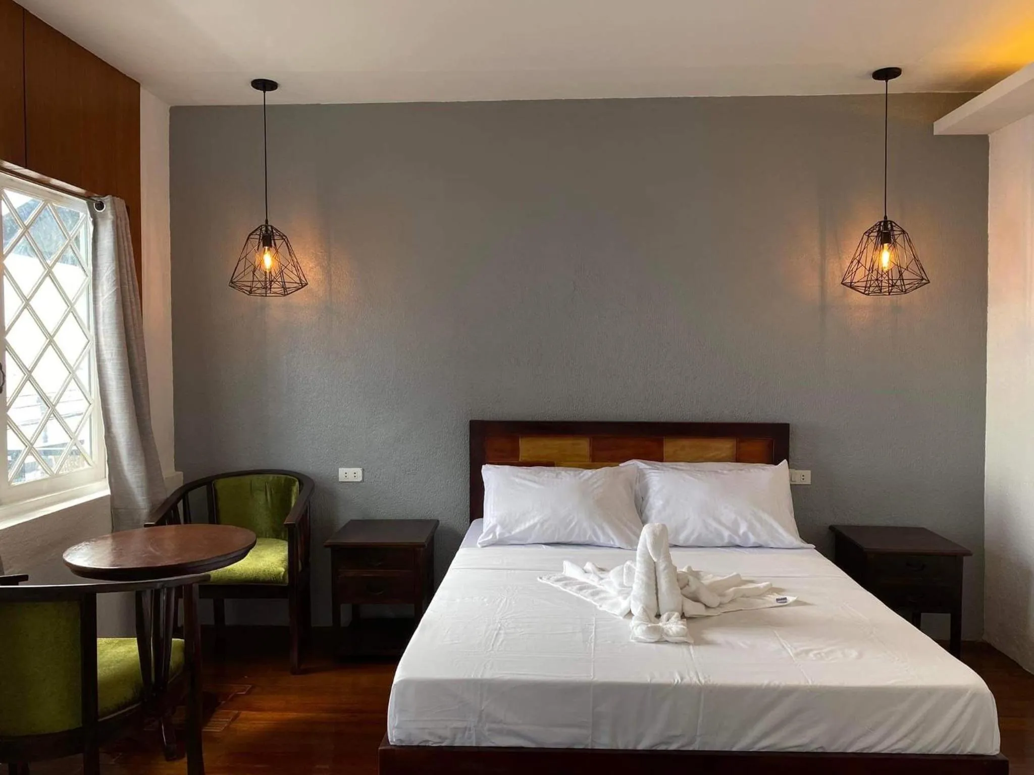 Bed in Dumaguete Seafront Hotel
