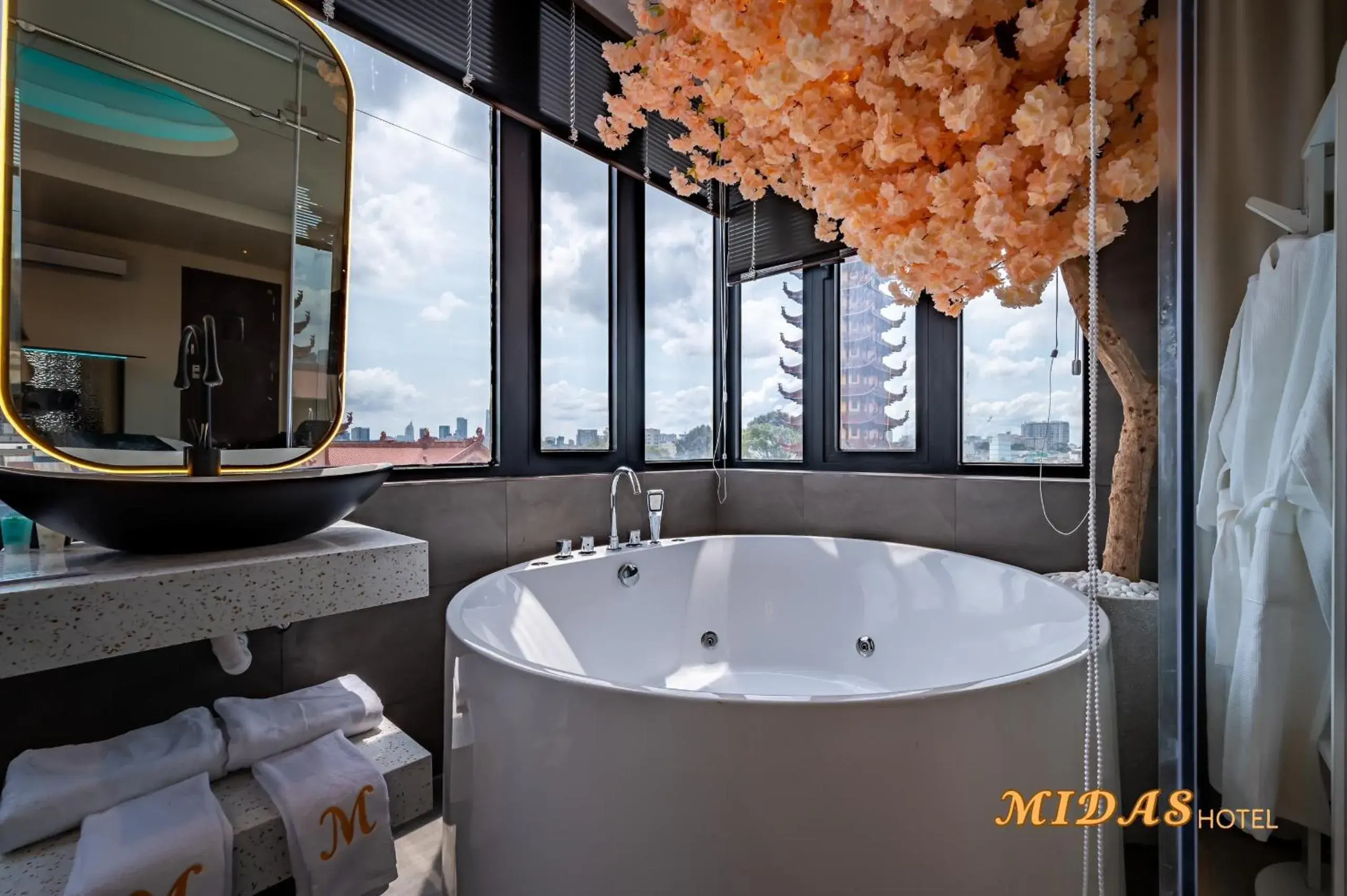 Bathroom in Midas Hotel Bathroom in Midas Hotel