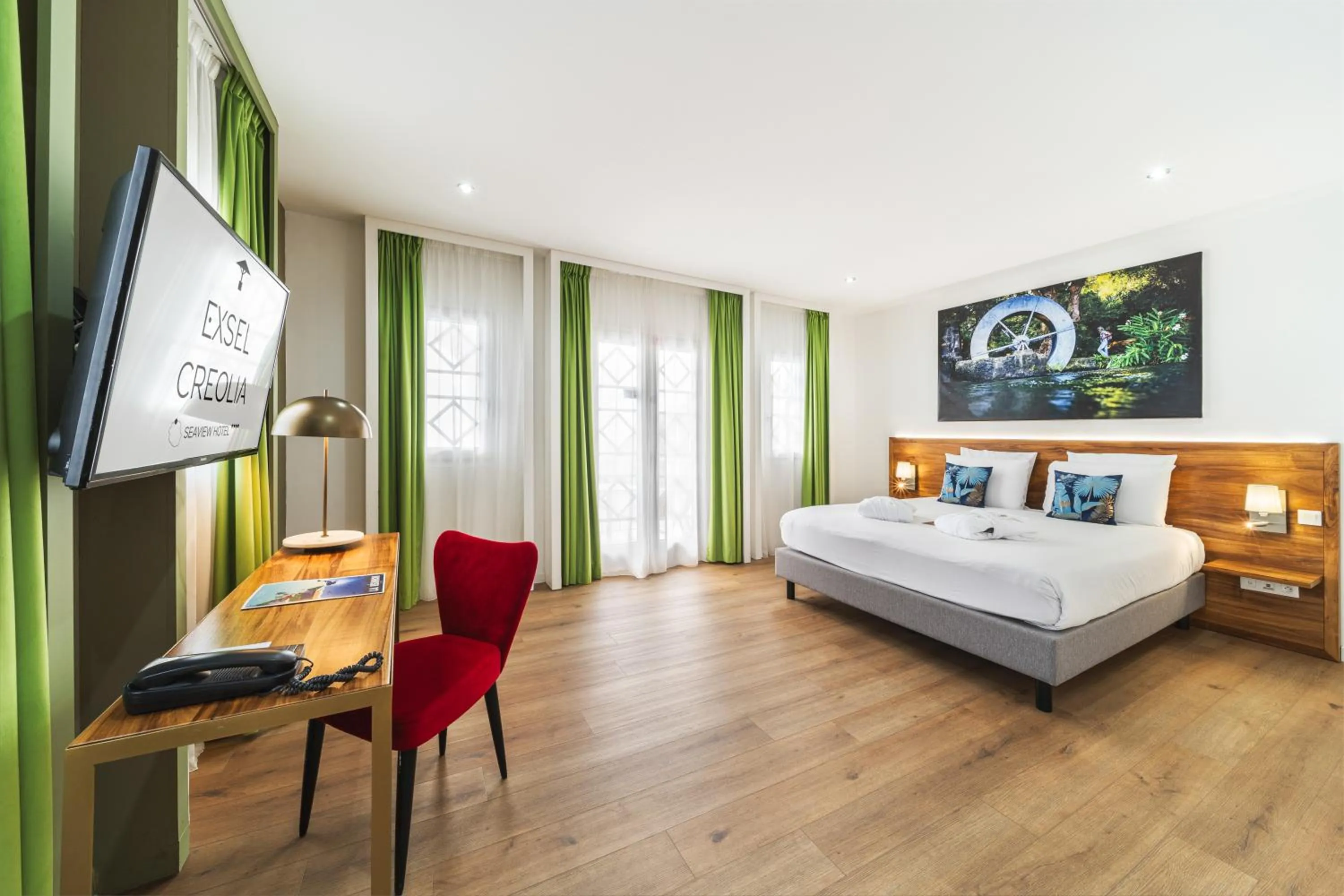 Photo of the whole room, Bed in Hôtel Exsel Créolia