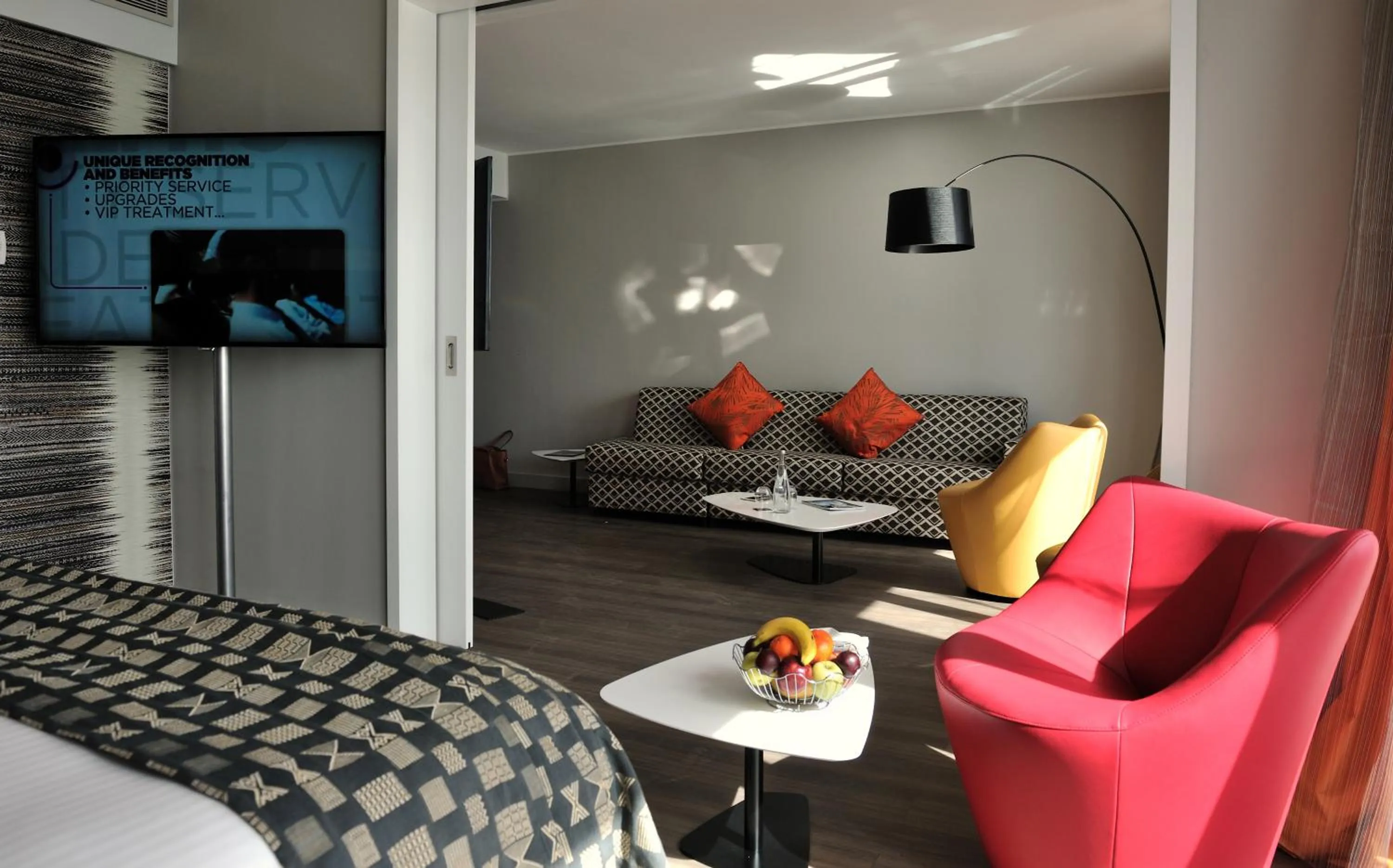 Living room, Bed in Pullman Dakar Teranga