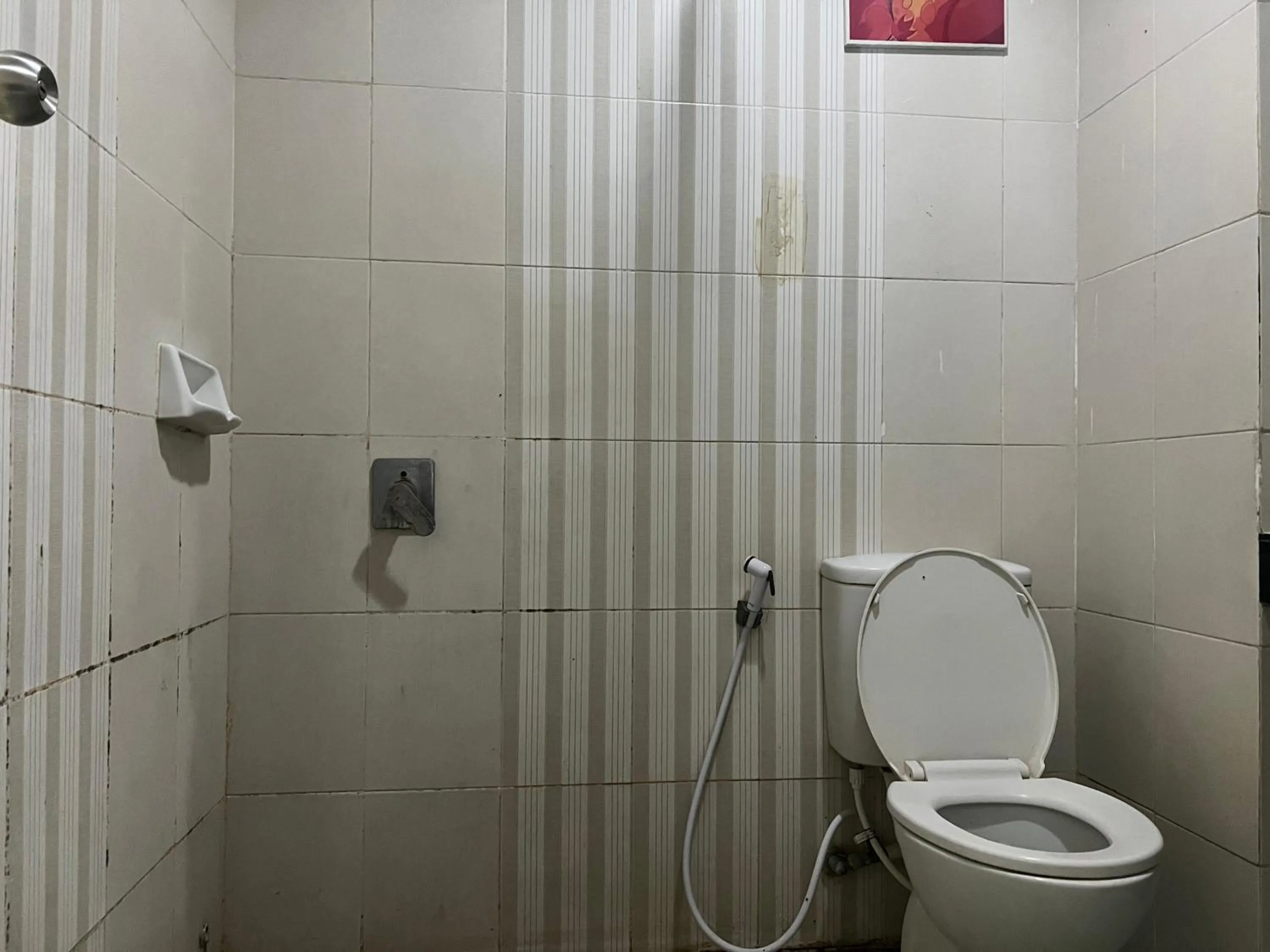 Bedroom in Hotel O Tri Homestay