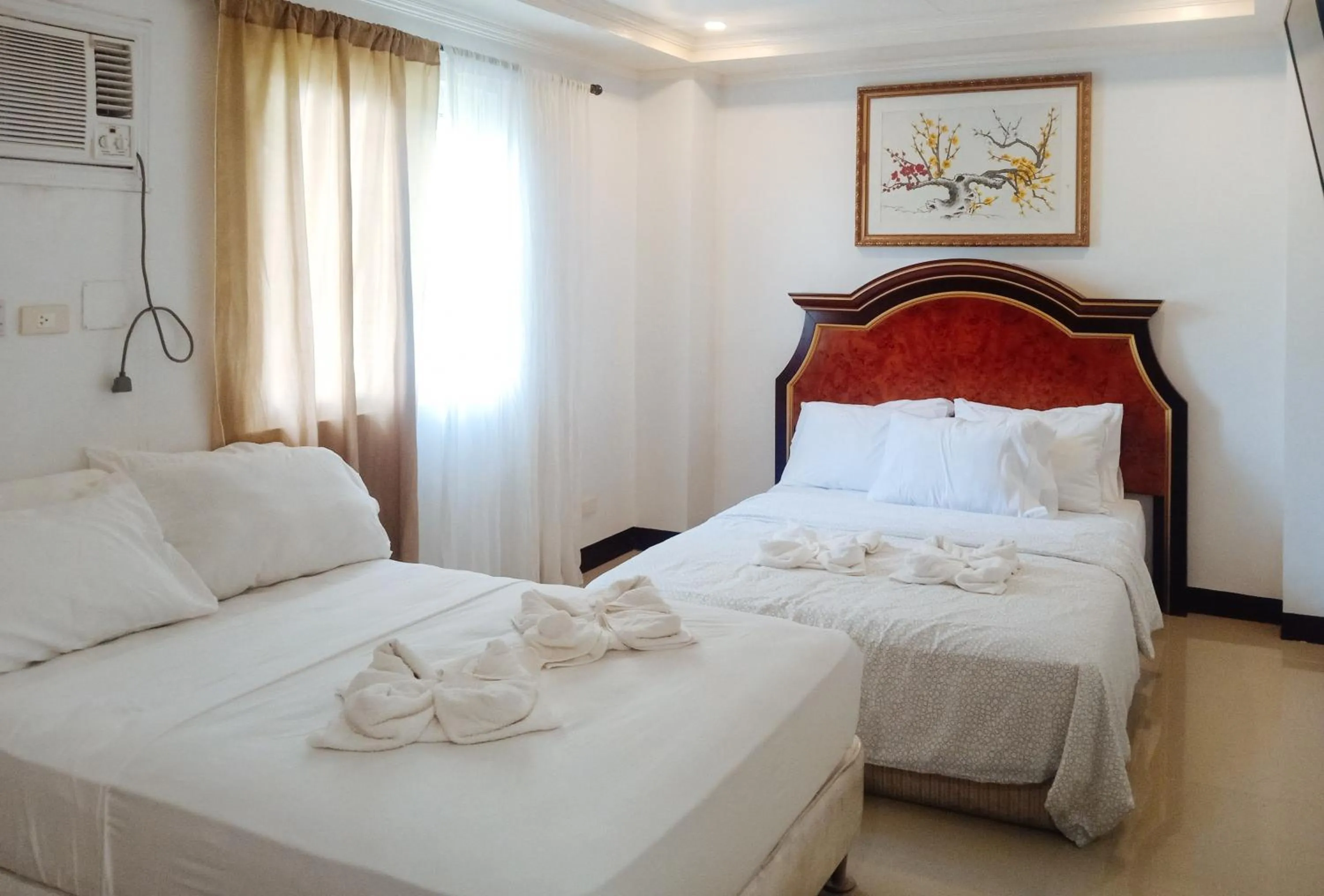 Bed in RedDoorz at Caree Boutique Hotel Bulan Sorsogon