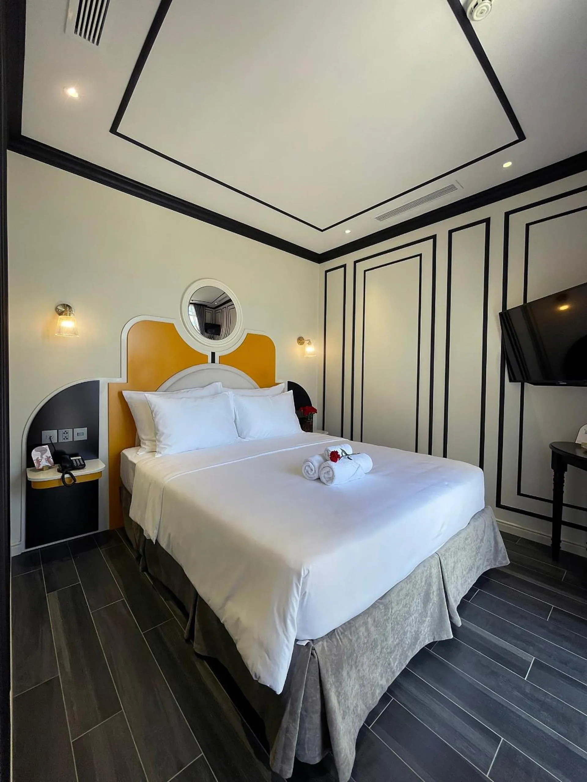 Bed in Le Bonheur Hotel