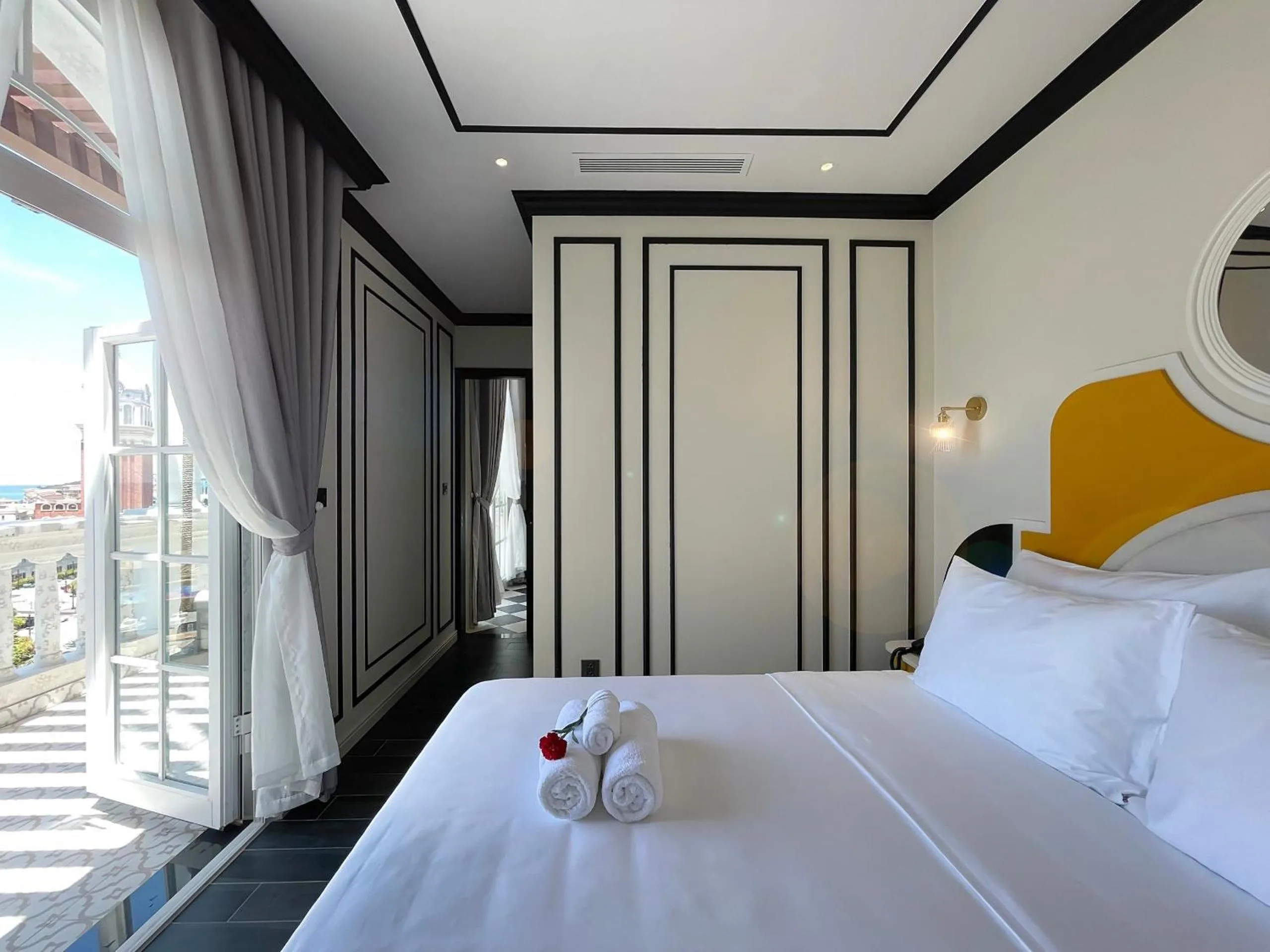 Bed in Le Bonheur Hotel