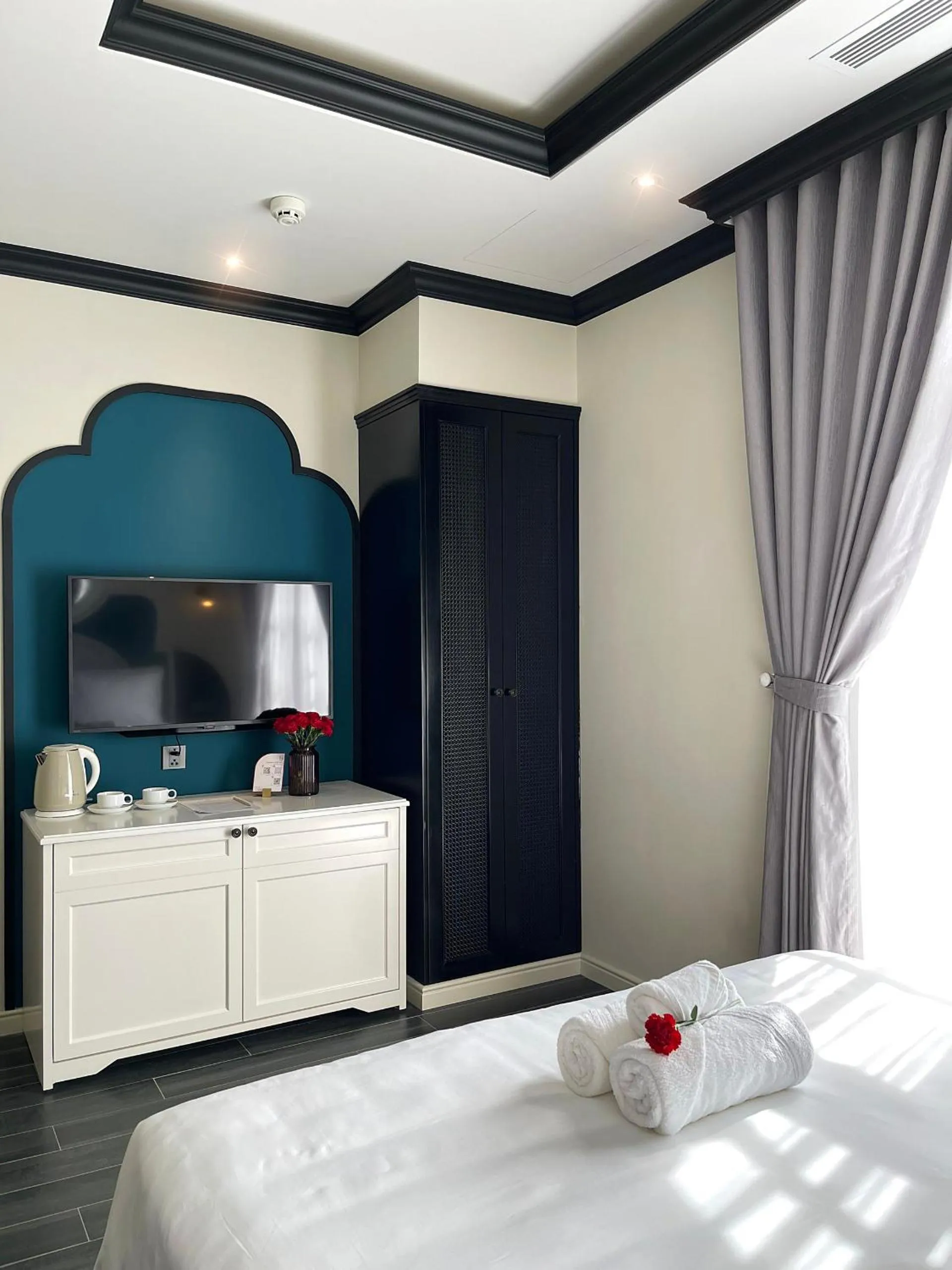 Bed in Le Bonheur Hotel