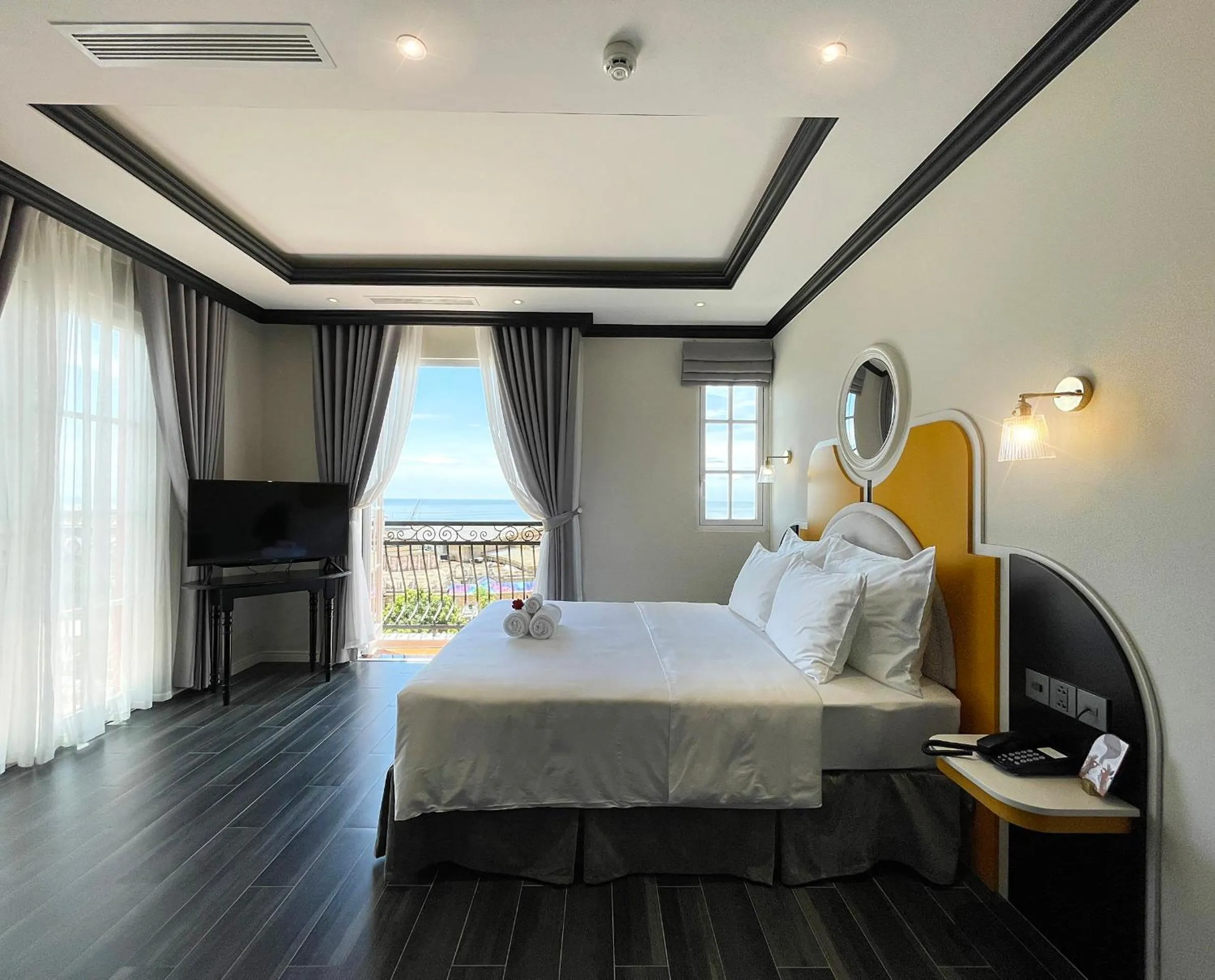 Bed in Le Bonheur Hotel