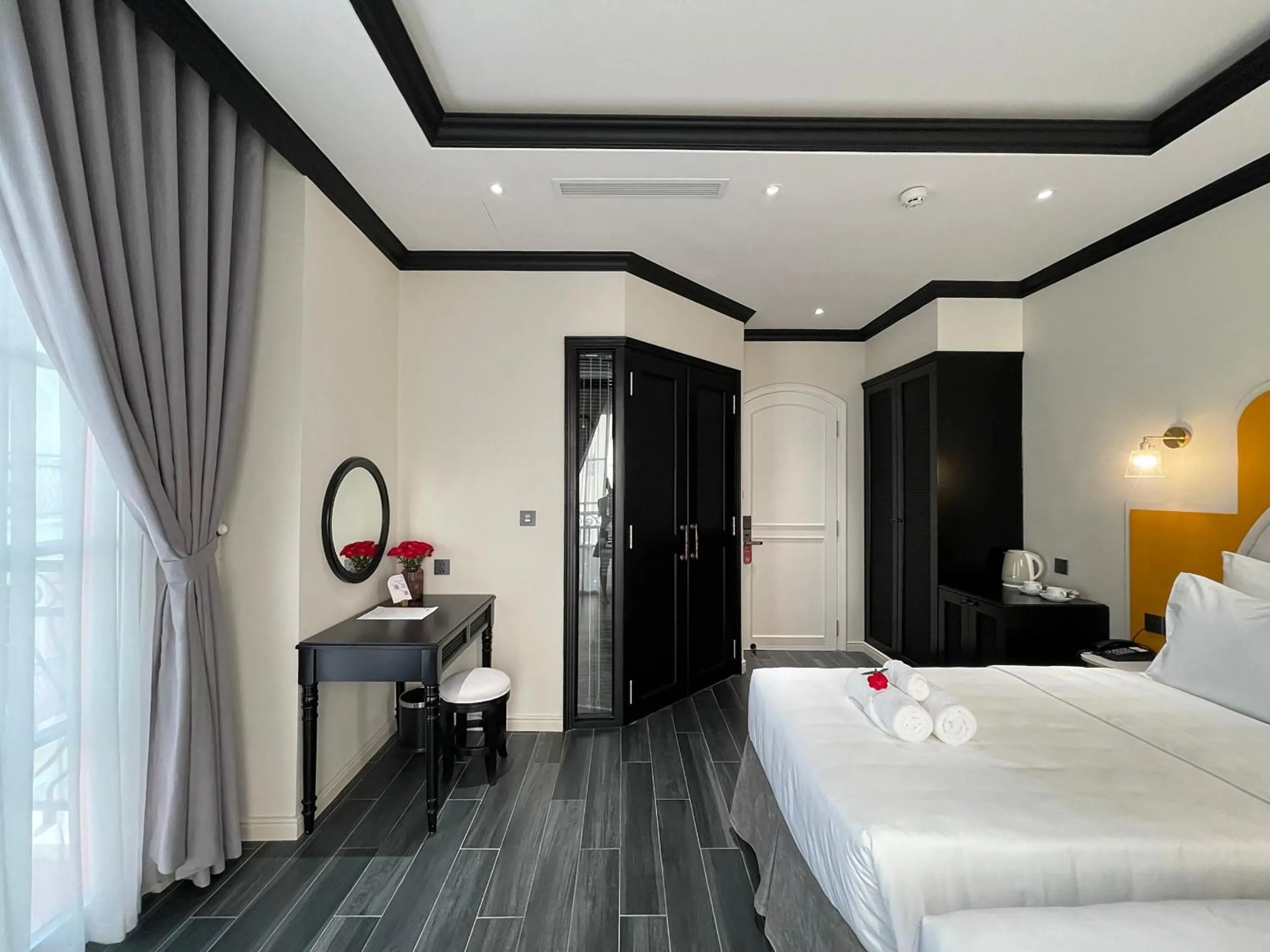 Bed in Le Bonheur Hotel