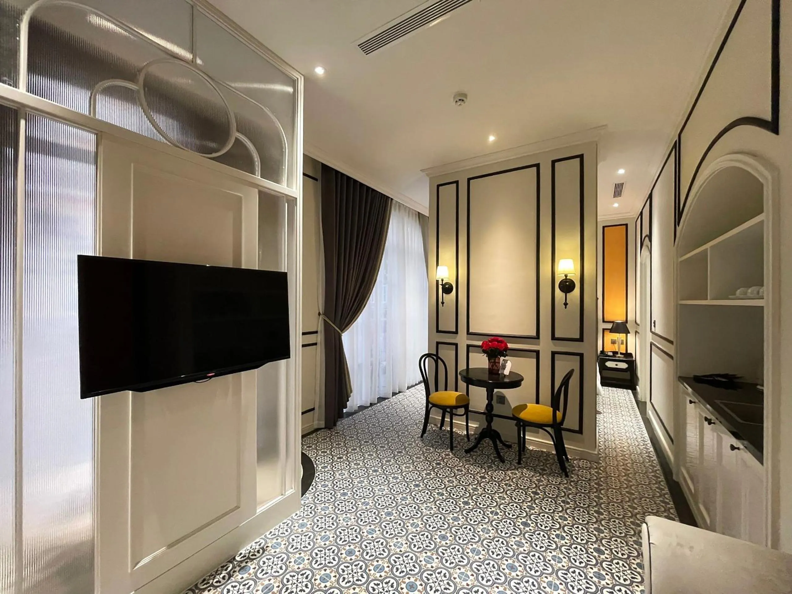 Bed in Le Bonheur Hotel