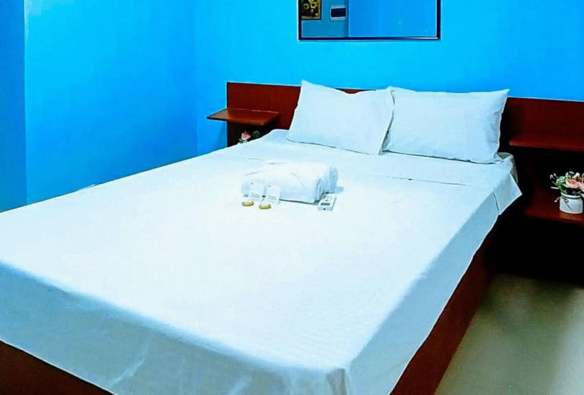 Bed in Jeanine's Travellers Inn by RedDoorz Bed in Jeanine's Travellers Inn by RedDoorz